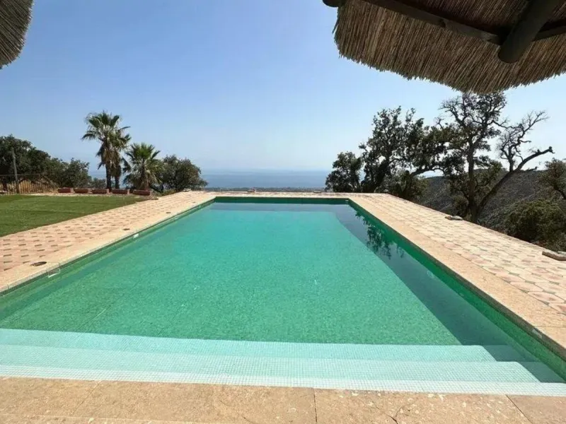 This wonderful estate is located in a privileged area with stunning panoramic sea and mountain views and has 38,000 meters of plot with a house of 2,300 meters built.