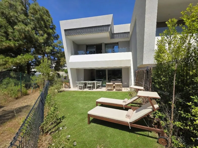 BRAND NEW LUXURY SEMI-DETACHED HOUSE - An exclusive semi-detached house (never used) with private garden set in a contemporary architectural style complex nestled in the heart of El Chaparral pine wood. This luxury property offers well distributed interio