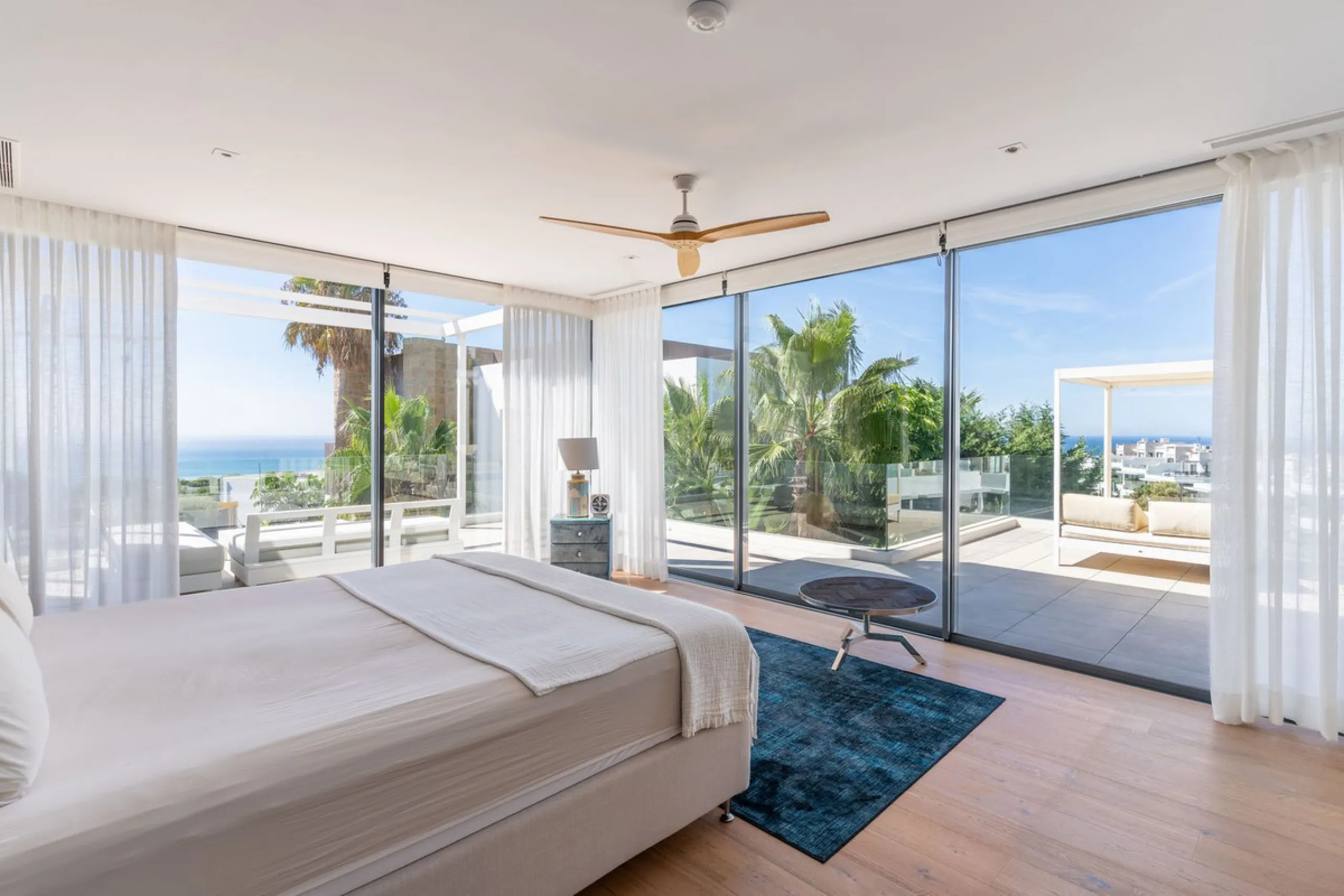 This exceptional luxury villa is situated in the prestigious area of Cabopino, Marbella East, offering a prime front line golf location with captivating views of both the sea and lush fairways. Designed to the highest standards, the property spans a gener