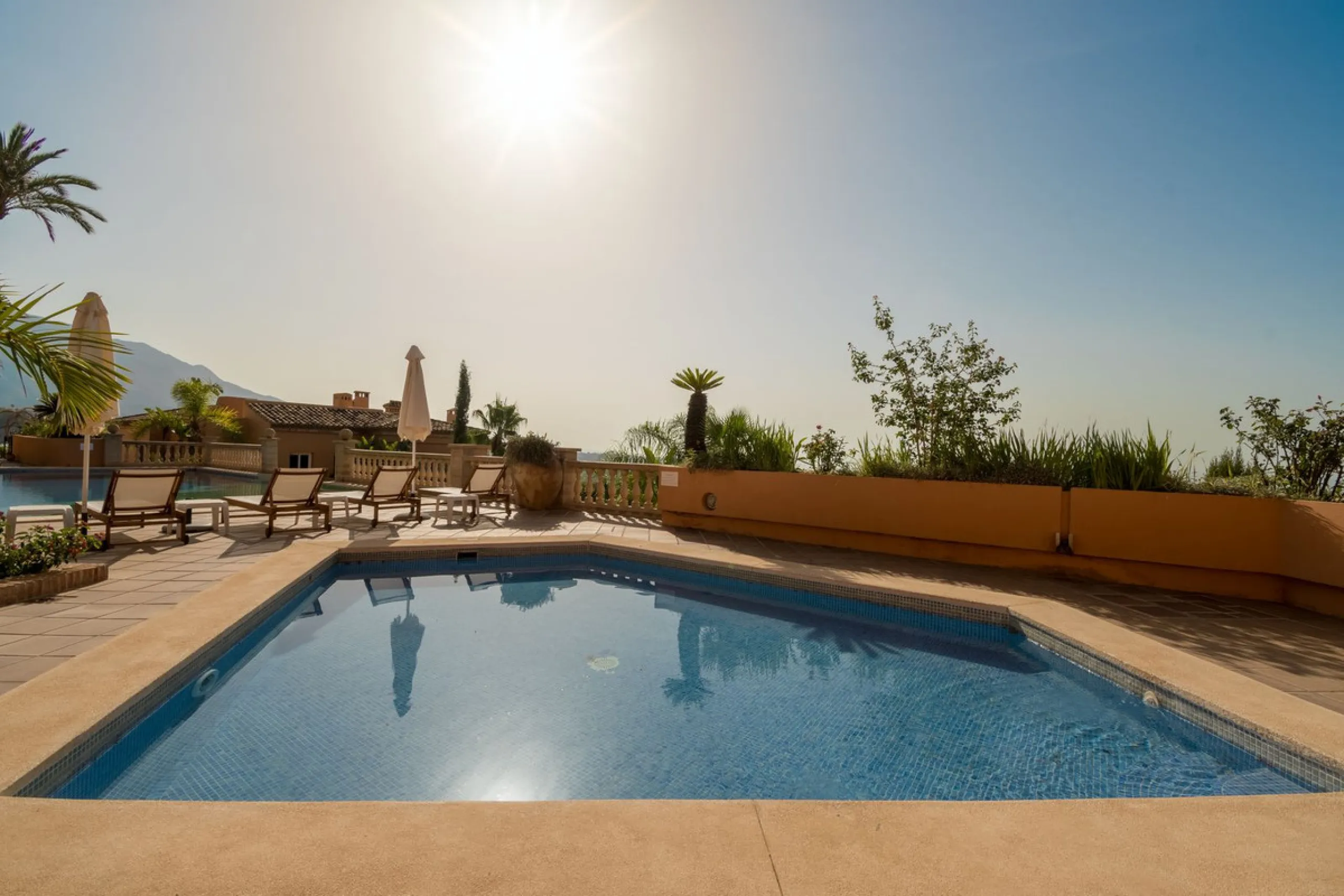 Absolutely stunning three bedroom luxury apartment located within the sought after gated and secure community of Les Belvederes in La Cerquilla, Nueva Andalucía. This stunning three-bedroom home offers uninterrupted panoramic views of the sea, mountains, 
