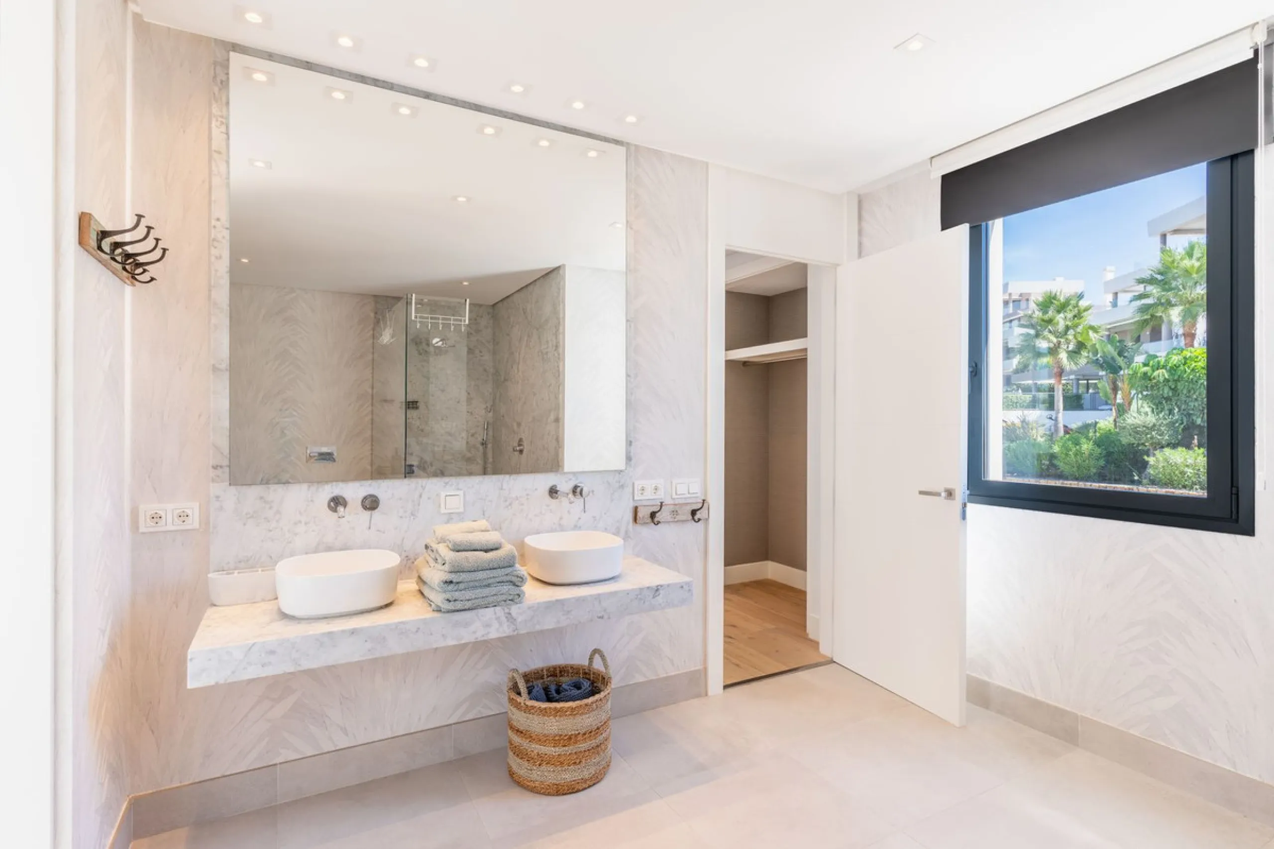 This exceptional luxury villa is situated in the prestigious area of Cabopino, Marbella East, offering a prime front line golf location with captivating views of both the sea and lush fairways. Designed to the highest standards, the property spans a gener
