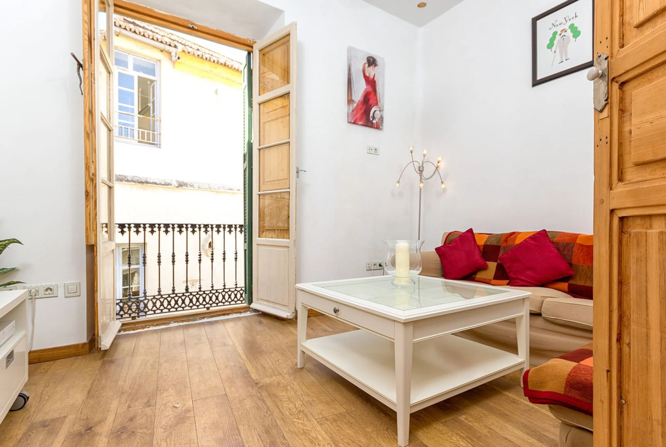 We are delighted to present this stunning city centre apartment, Casa 1880, a 19th-century gem located just a short stroll from Plaza de la Constitución in Malaga Centro. This exceptional property offers two bedrooms, one bathroom, an office, and a cozy l