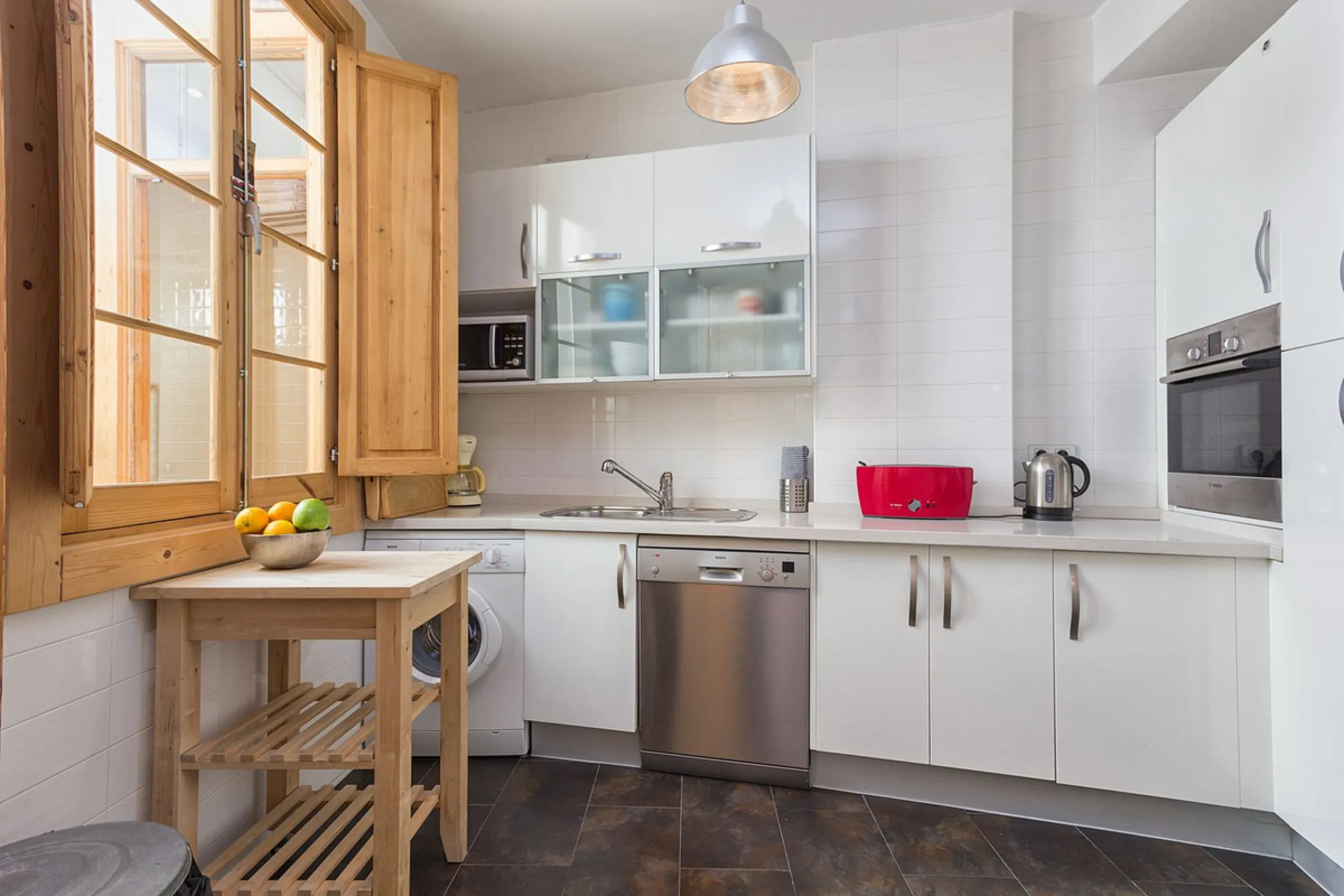 We are delighted to present this stunning city centre apartment, Casa 1880, a 19th-century gem located just a short stroll from Plaza de la Constitución in Malaga Centro. This exceptional property offers two bedrooms, one bathroom, an office, and a cozy l