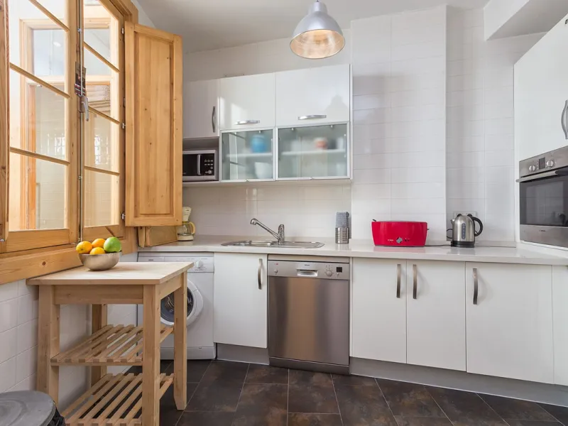 We are delighted to present this stunning city centre apartment, Casa 1880, a 19th-century gem located just a short stroll from Plaza de la Constitución in Malaga Centro. This exceptional property offers two bedrooms, one bathroom, an office, and a cozy l