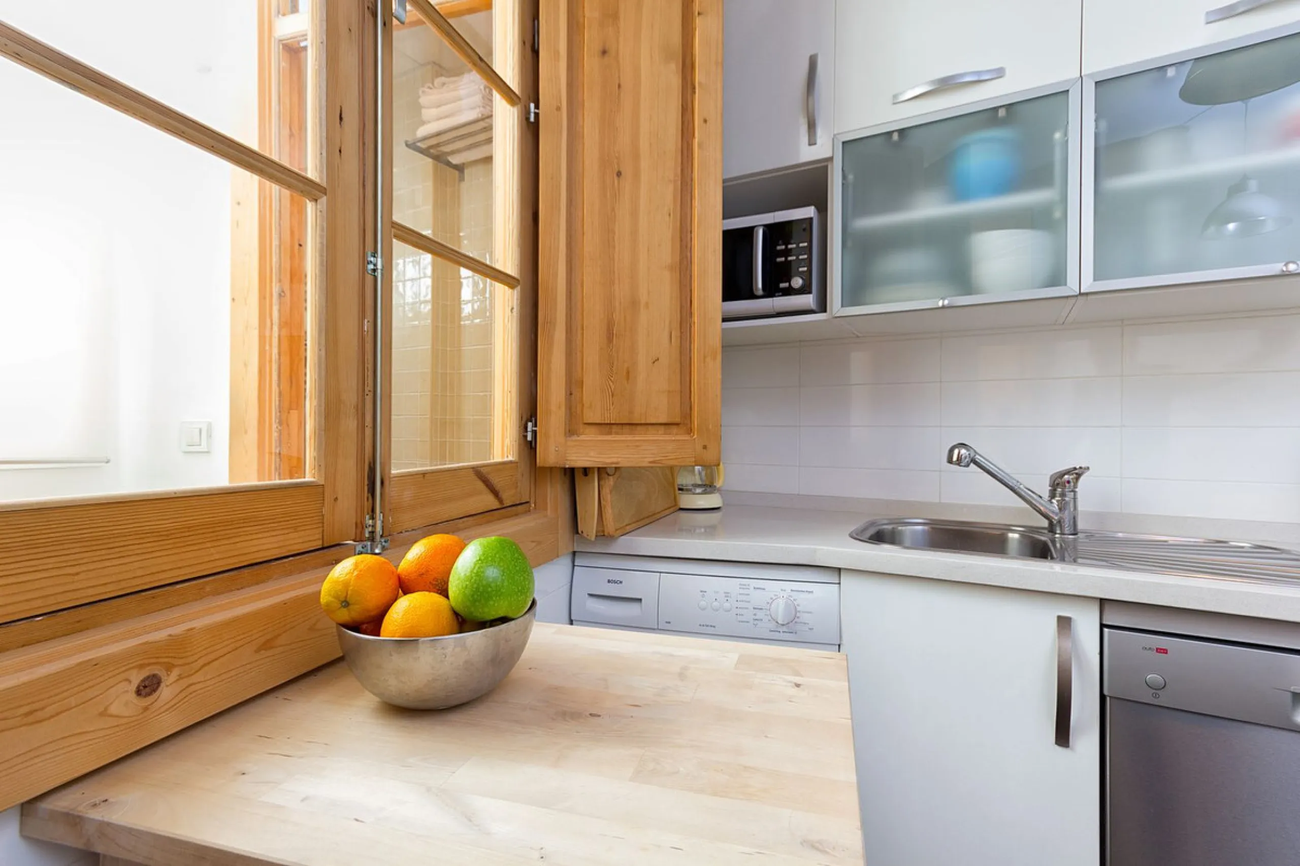 We are delighted to present this stunning city centre apartment, Casa 1880, a 19th-century gem located just a short stroll from Plaza de la Constitución in Malaga Centro. This exceptional property offers two bedrooms, one bathroom, an office, and a cozy l
