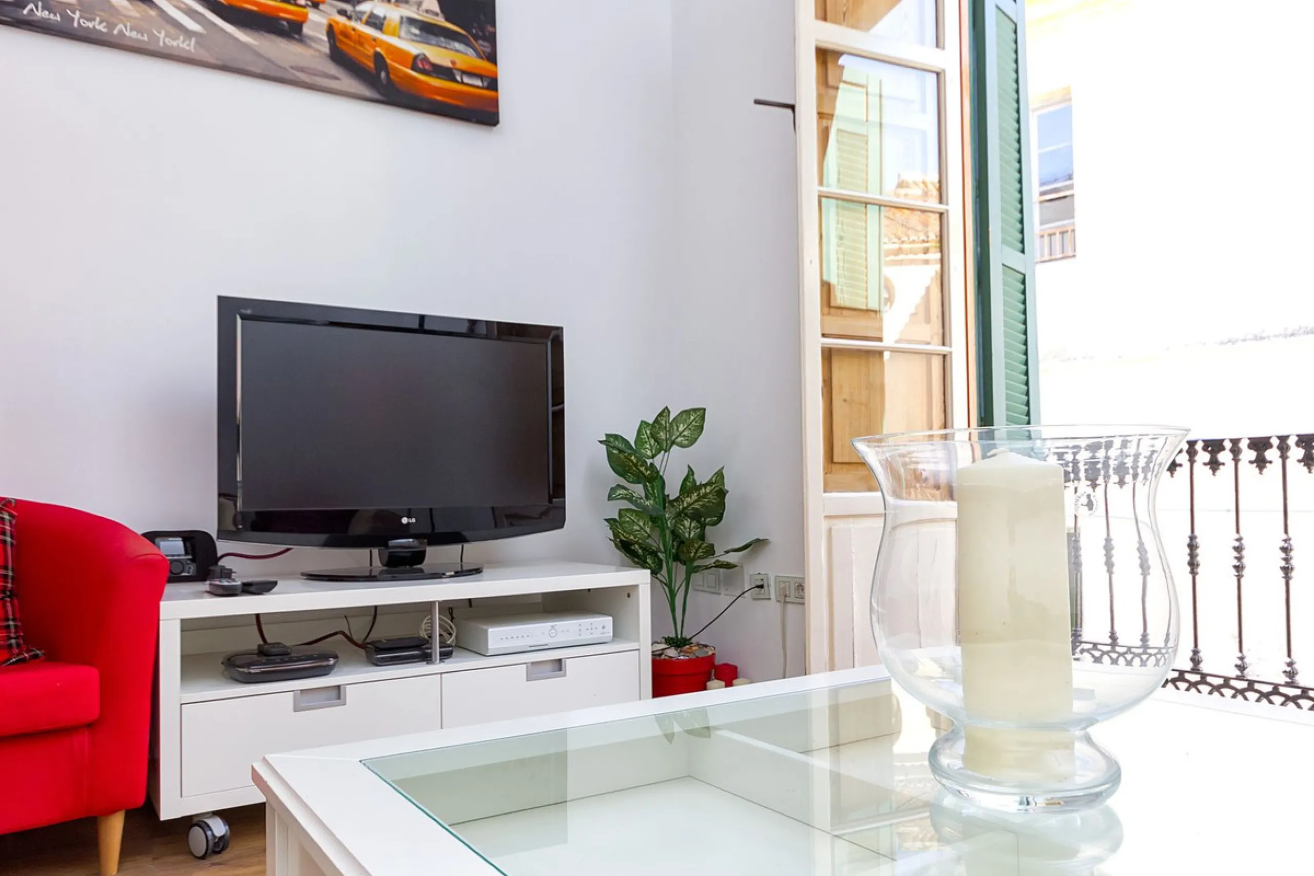 We are delighted to present this stunning city centre apartment, Casa 1880, a 19th-century gem located just a short stroll from Plaza de la Constitución in Malaga Centro. This exceptional property offers two bedrooms, one bathroom, an office, and a cozy l