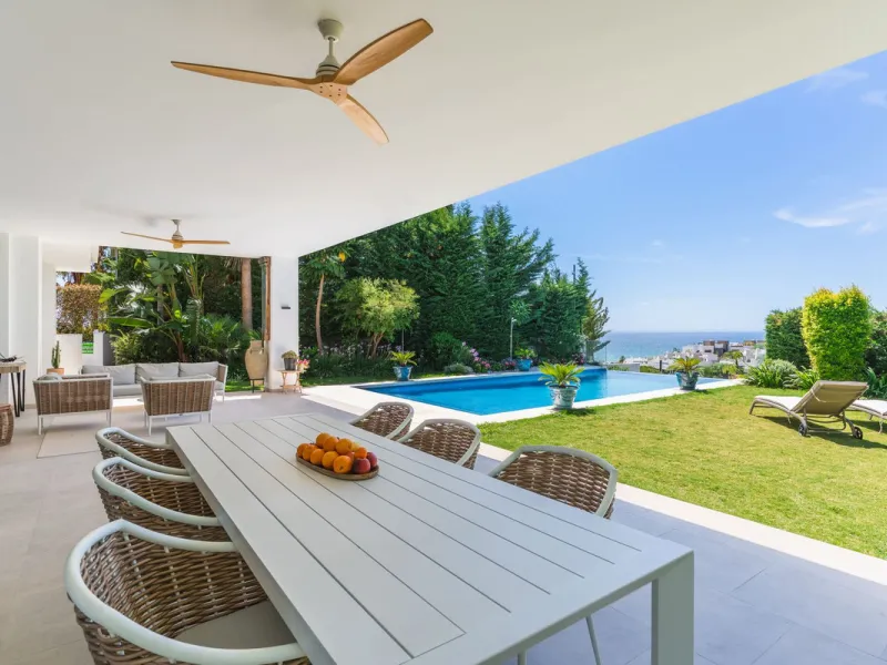 This exceptional luxury villa is situated in the prestigious area of Cabopino, Marbella East, offering a prime front line golf location with captivating views of both the sea and lush fairways. Designed to the highest standards, the property spans a gener