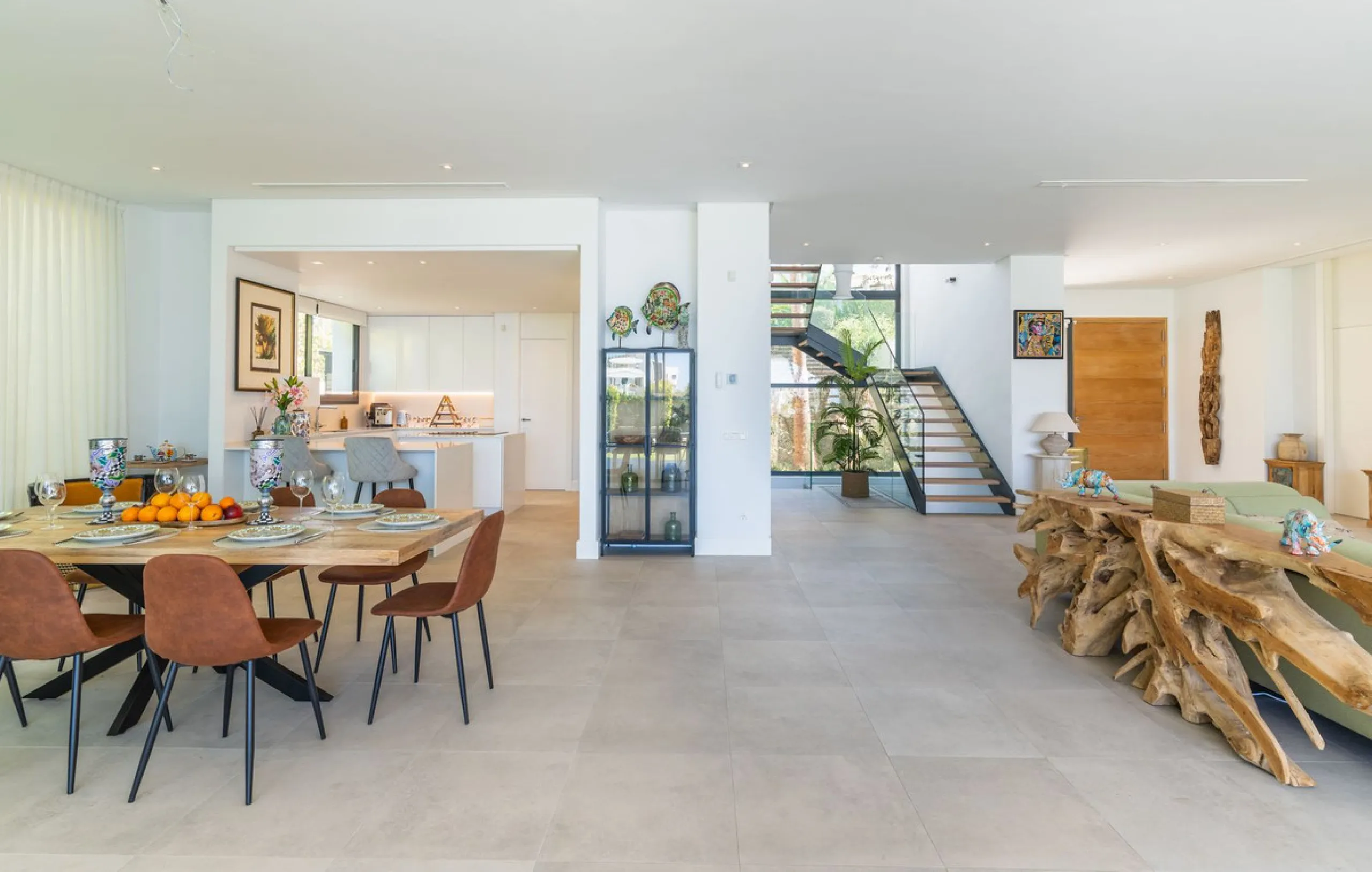 This exceptional luxury villa is situated in the prestigious area of Cabopino, Marbella East, offering a prime front line golf location with captivating views of both the sea and lush fairways. Designed to the highest standards, the property spans a gener