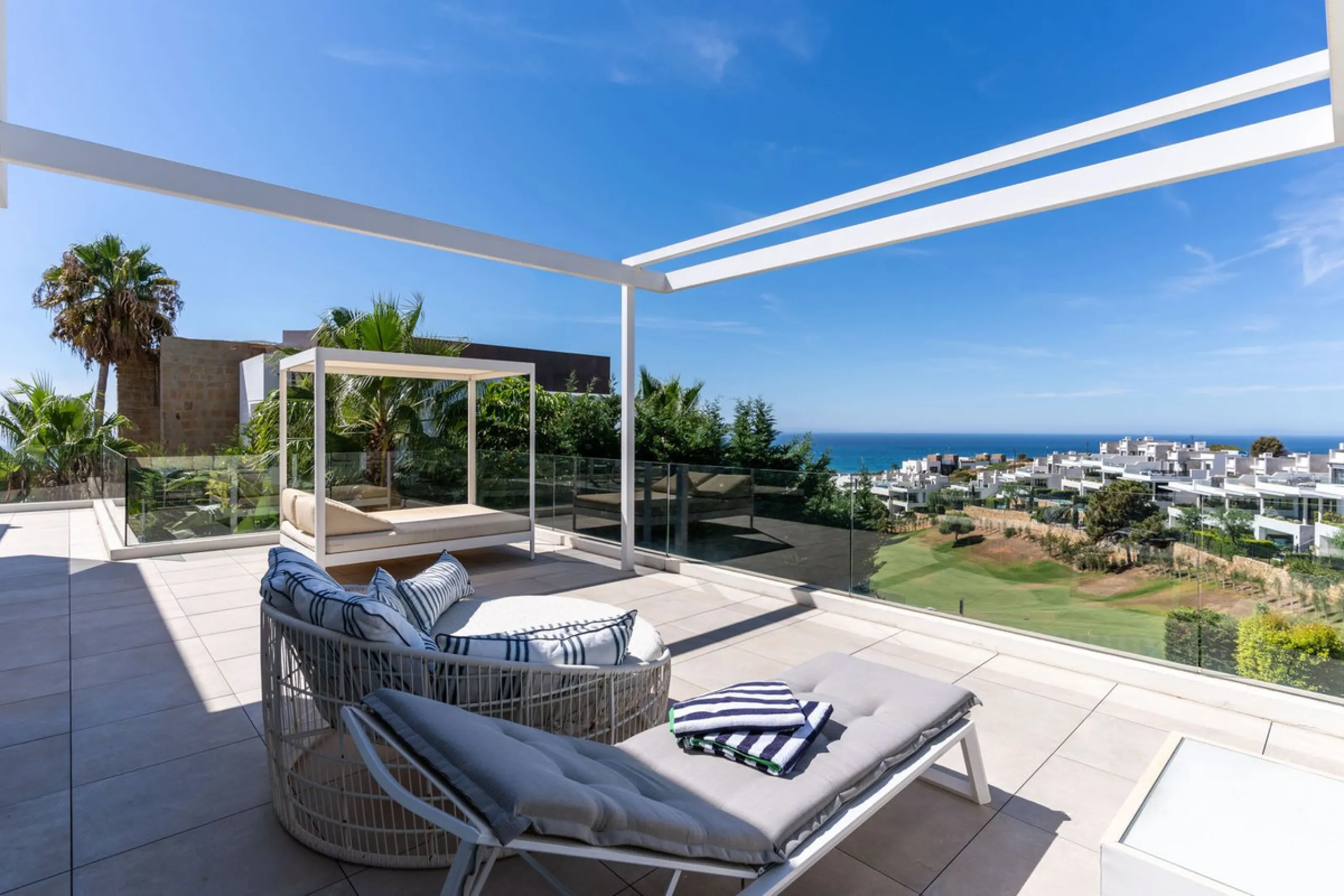 This exceptional luxury villa is situated in the prestigious area of Cabopino, Marbella East, offering a prime front line golf location with captivating views of both the sea and lush fairways. Designed to the highest standards, the property spans a gener