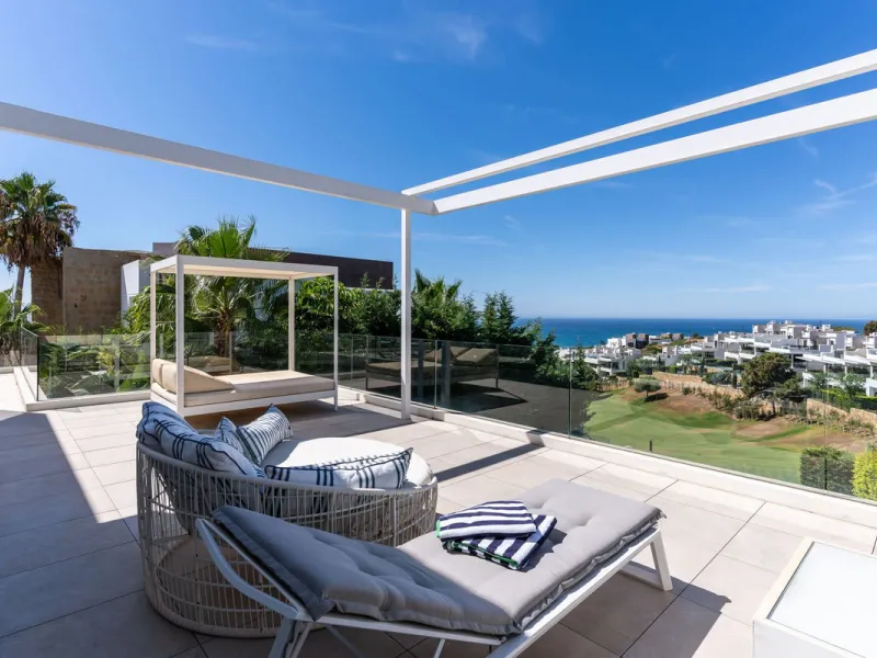 This exceptional luxury villa is situated in the prestigious area of Cabopino, Marbella East, offering a prime front line golf location with captivating views of both the sea and lush fairways. Designed to the highest standards, the property spans a gener