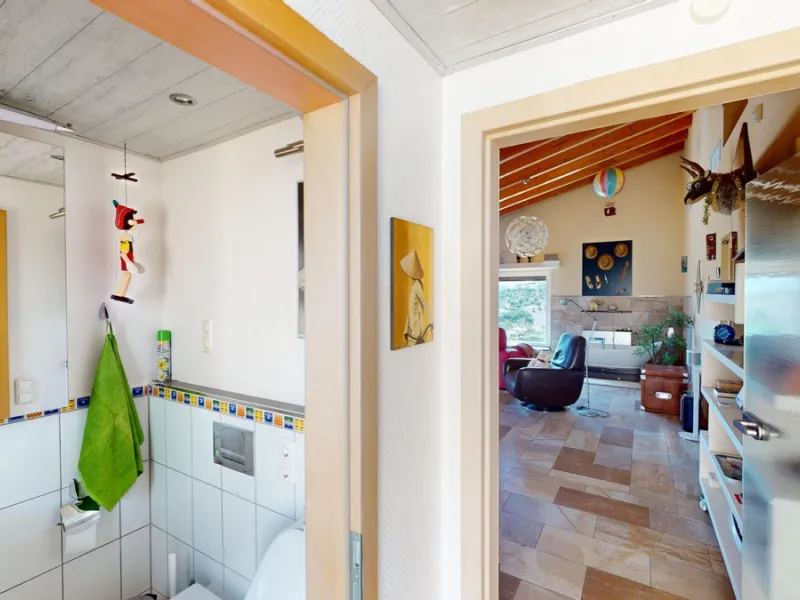 Stunning Villa Below Frigiliana for Sale. This impressive villa, nestled below Frigiliana, offers two separate living units across two floors, each with its own driveway and privacy. The upper unit spans 150 m2 and features a spacious open-plan living and