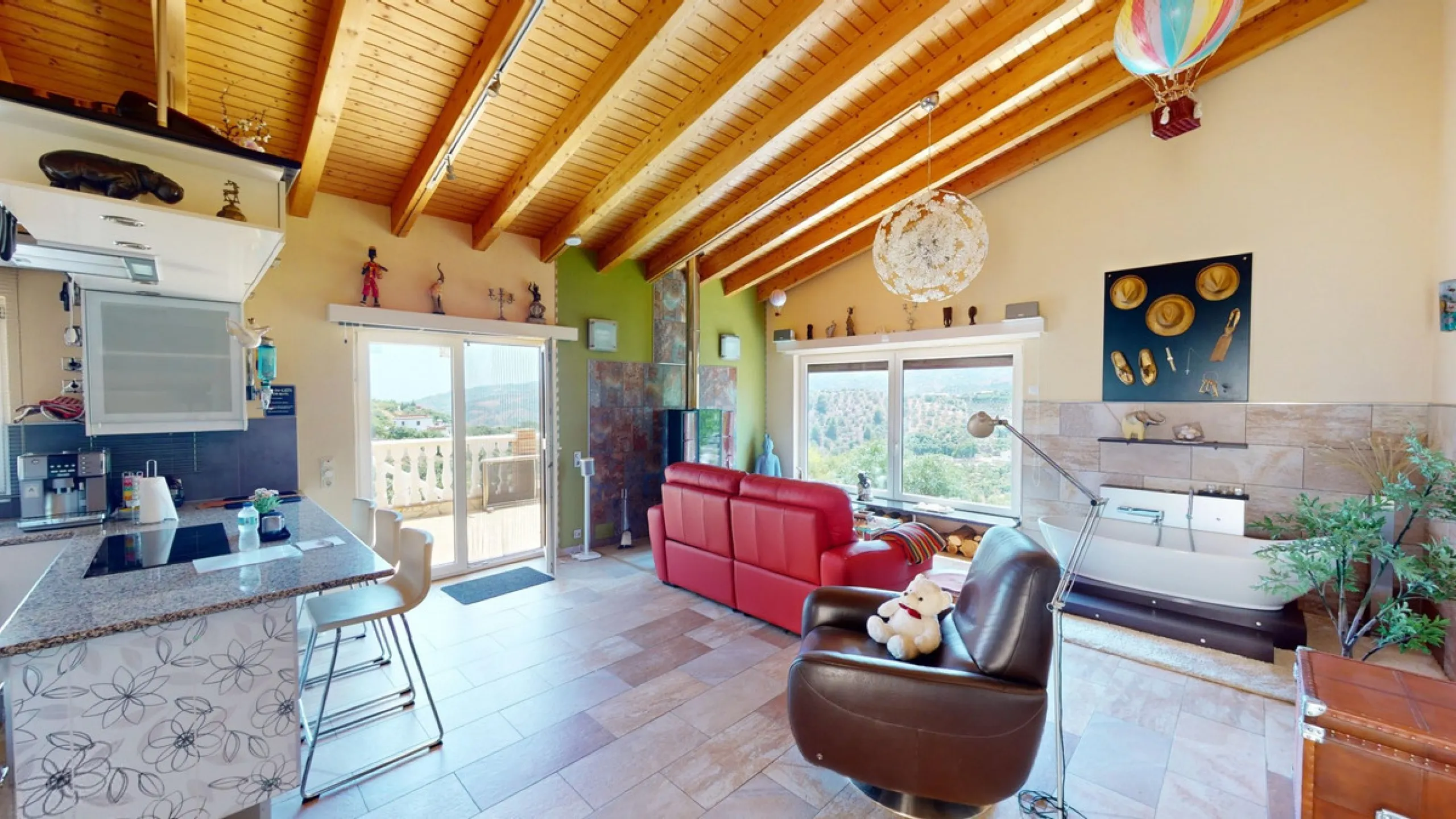 Stunning Villa Below Frigiliana for Sale. This impressive villa, nestled below Frigiliana, offers two separate living units across two floors, each with its own driveway and privacy. The upper unit spans 150 m2 and features a spacious open-plan living and