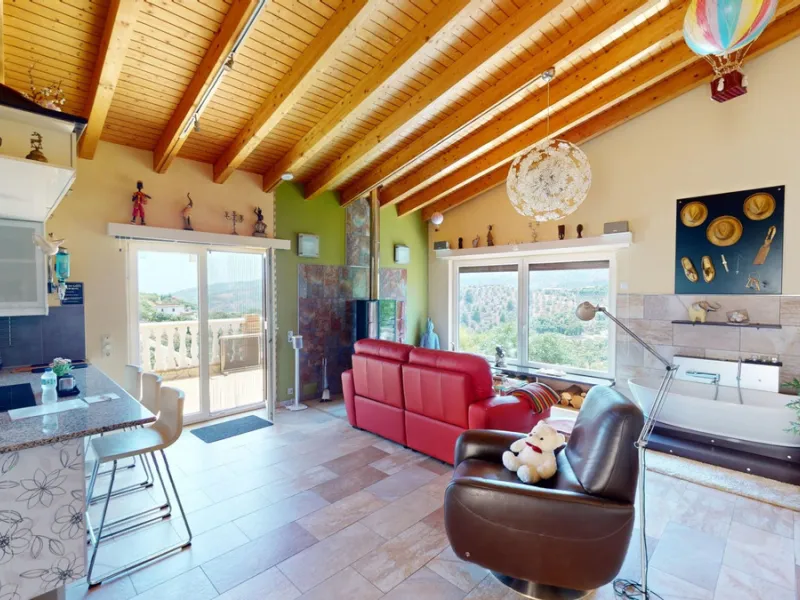 Stunning Villa Below Frigiliana for Sale. This impressive villa, nestled below Frigiliana, offers two separate living units across two floors, each with its own driveway and privacy. The upper unit spans 150 m2 and features a spacious open-plan living and