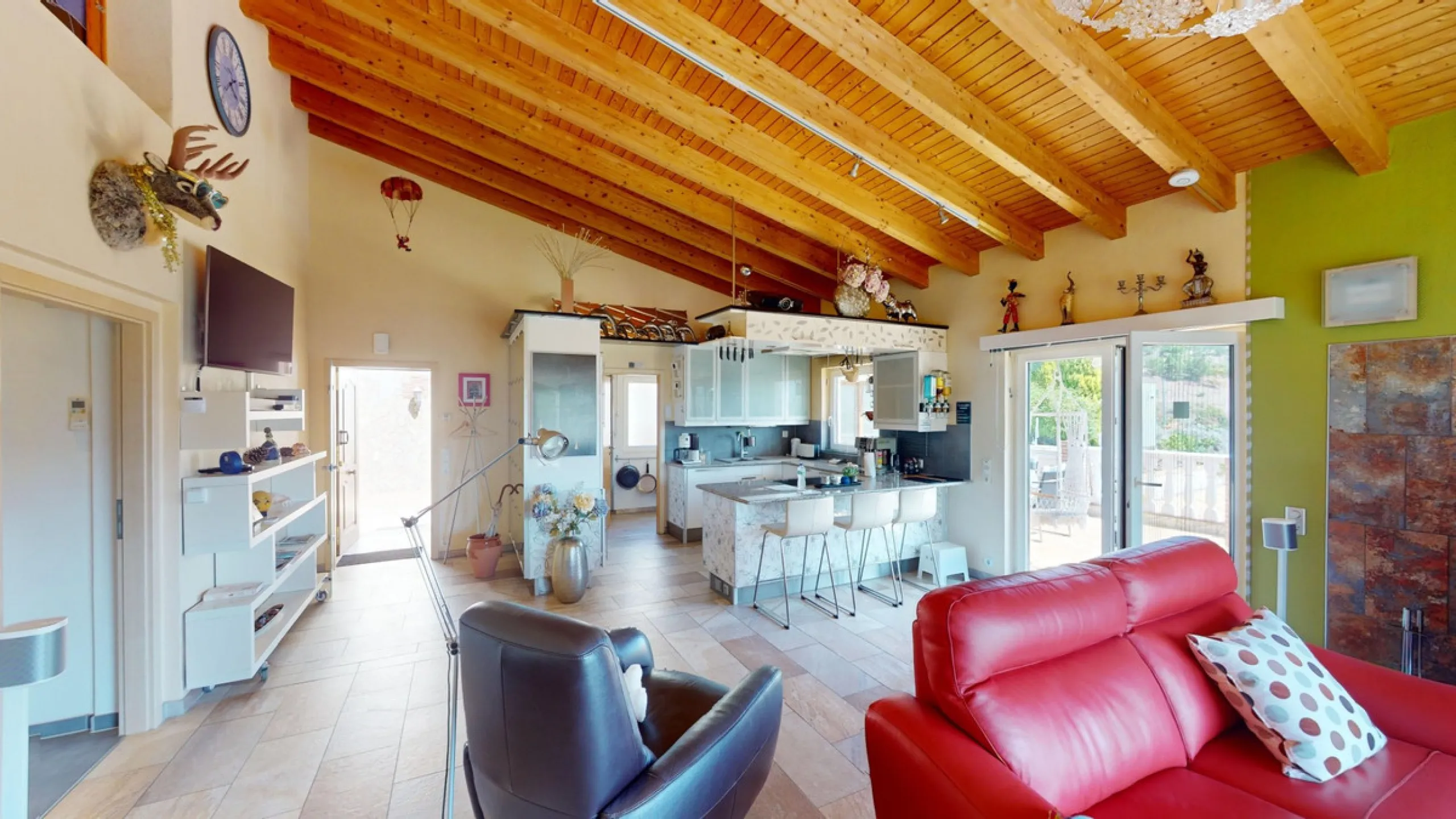 Stunning Villa Below Frigiliana for Sale. This impressive villa, nestled below Frigiliana, offers two separate living units across two floors, each with its own driveway and privacy. The upper unit spans 150 m2 and features a spacious open-plan living and
