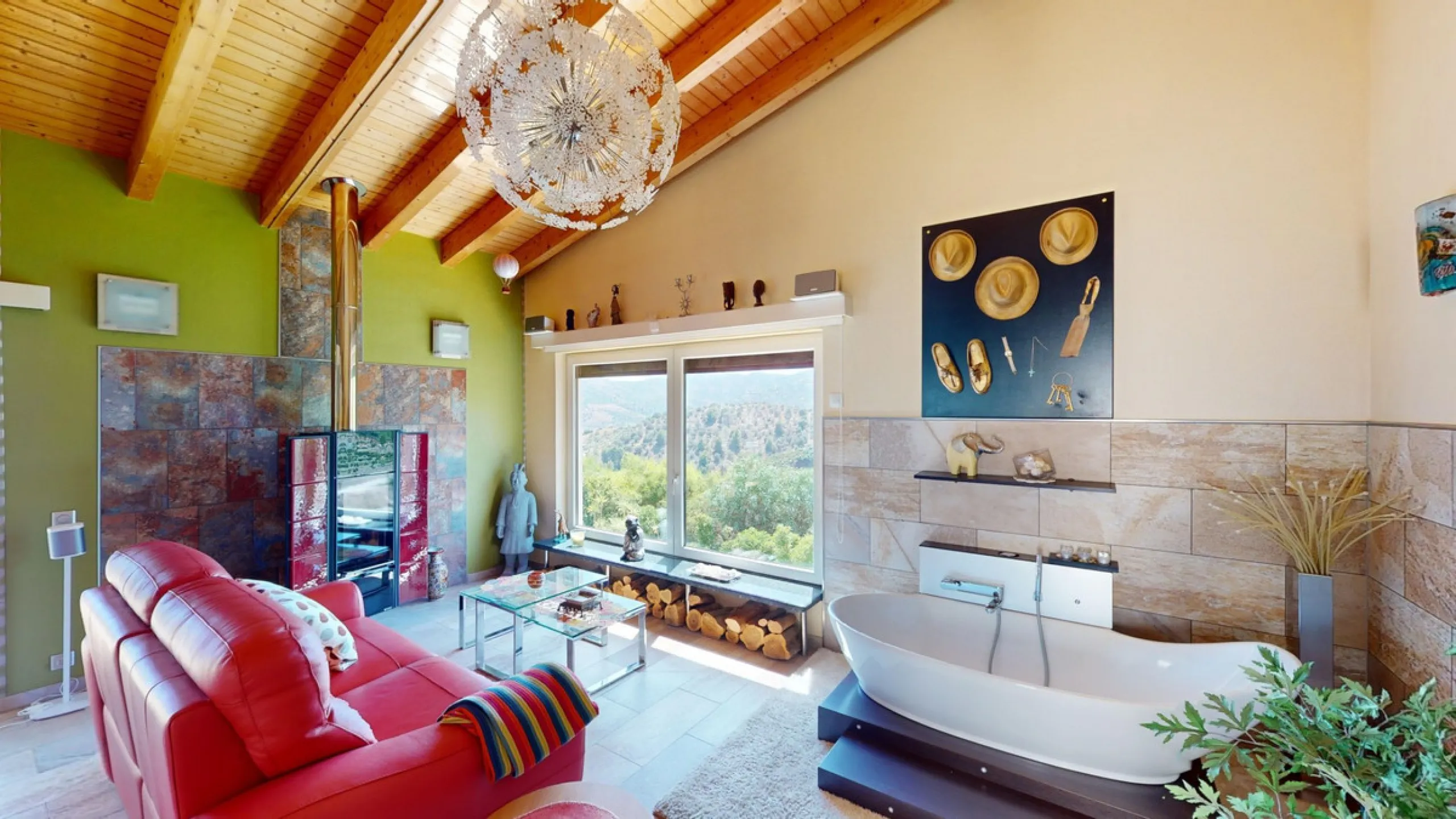 Stunning Villa Below Frigiliana for Sale. This impressive villa, nestled below Frigiliana, offers two separate living units across two floors, each with its own driveway and privacy. The upper unit spans 150 m2 and features a spacious open-plan living and