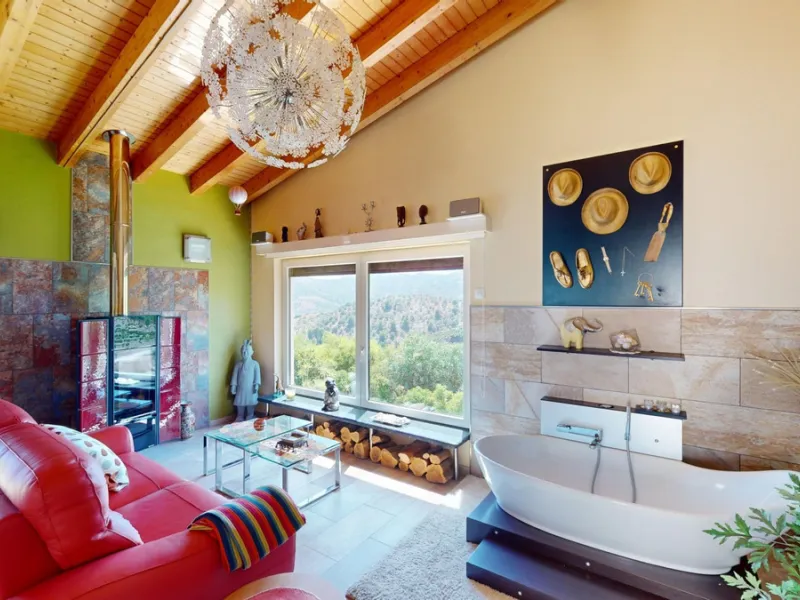 Stunning Villa Below Frigiliana for Sale. This impressive villa, nestled below Frigiliana, offers two separate living units across two floors, each with its own driveway and privacy. The upper unit spans 150 m2 and features a spacious open-plan living and