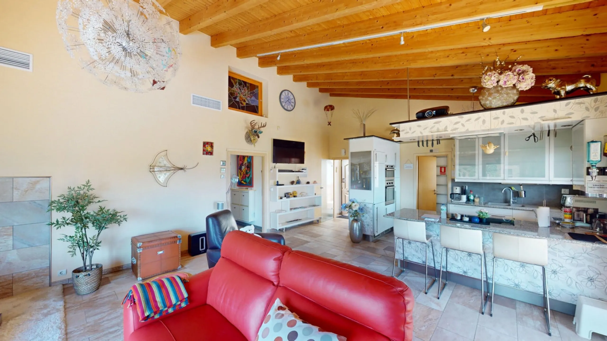 Stunning Villa Below Frigiliana for Sale. This impressive villa, nestled below Frigiliana, offers two separate living units across two floors, each with its own driveway and privacy. The upper unit spans 150 m2 and features a spacious open-plan living and