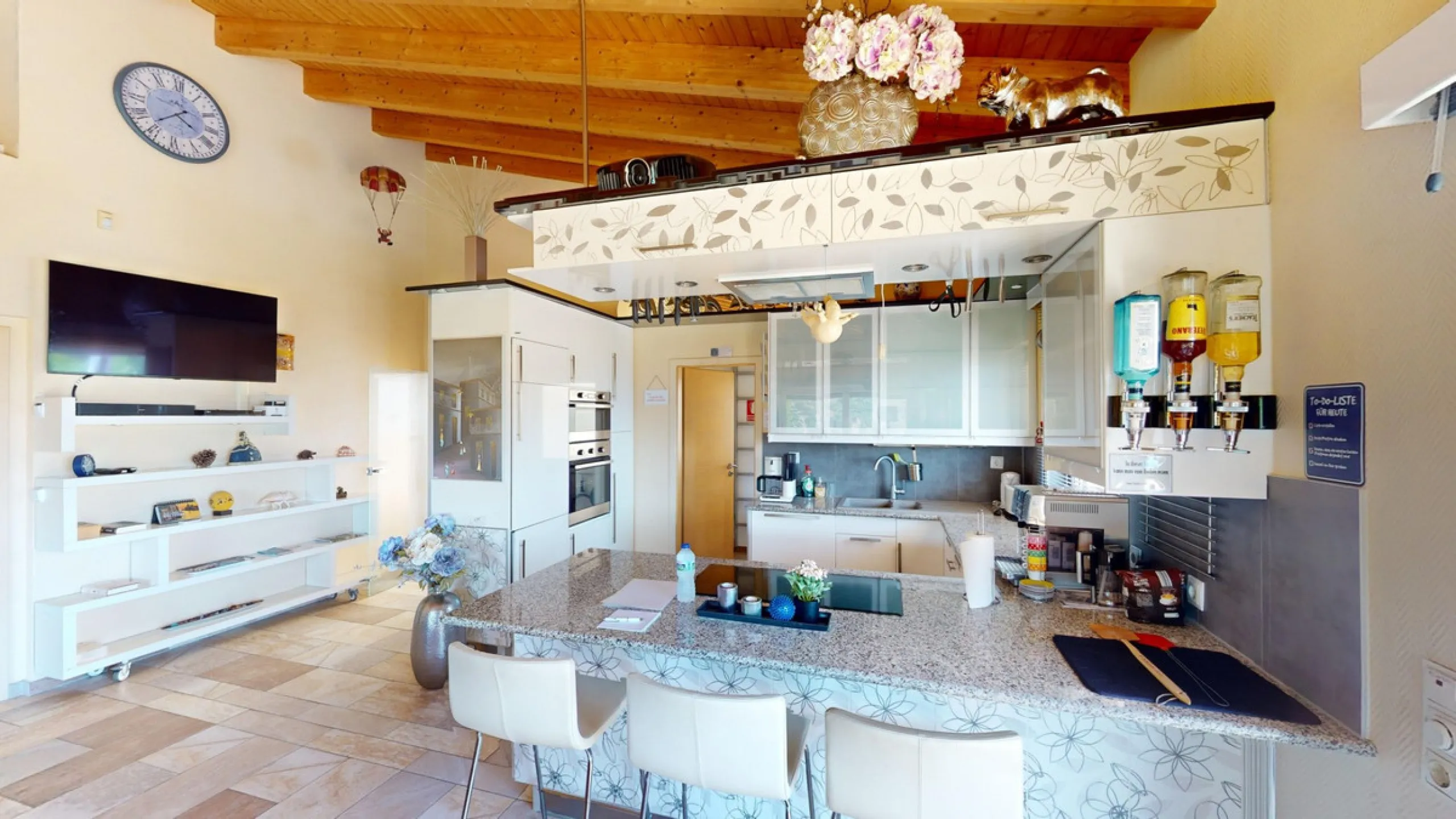 Stunning Villa Below Frigiliana for Sale. This impressive villa, nestled below Frigiliana, offers two separate living units across two floors, each with its own driveway and privacy. The upper unit spans 150 m2 and features a spacious open-plan living and
