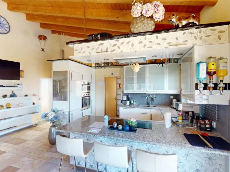 Stunning Villa Below Frigiliana for Sale. This impressive villa, nestled below Frigiliana, offers two separate living units across two floors, each with its own driveway and privacy. The upper unit spans 150 m2 and features a spacious open-plan living and