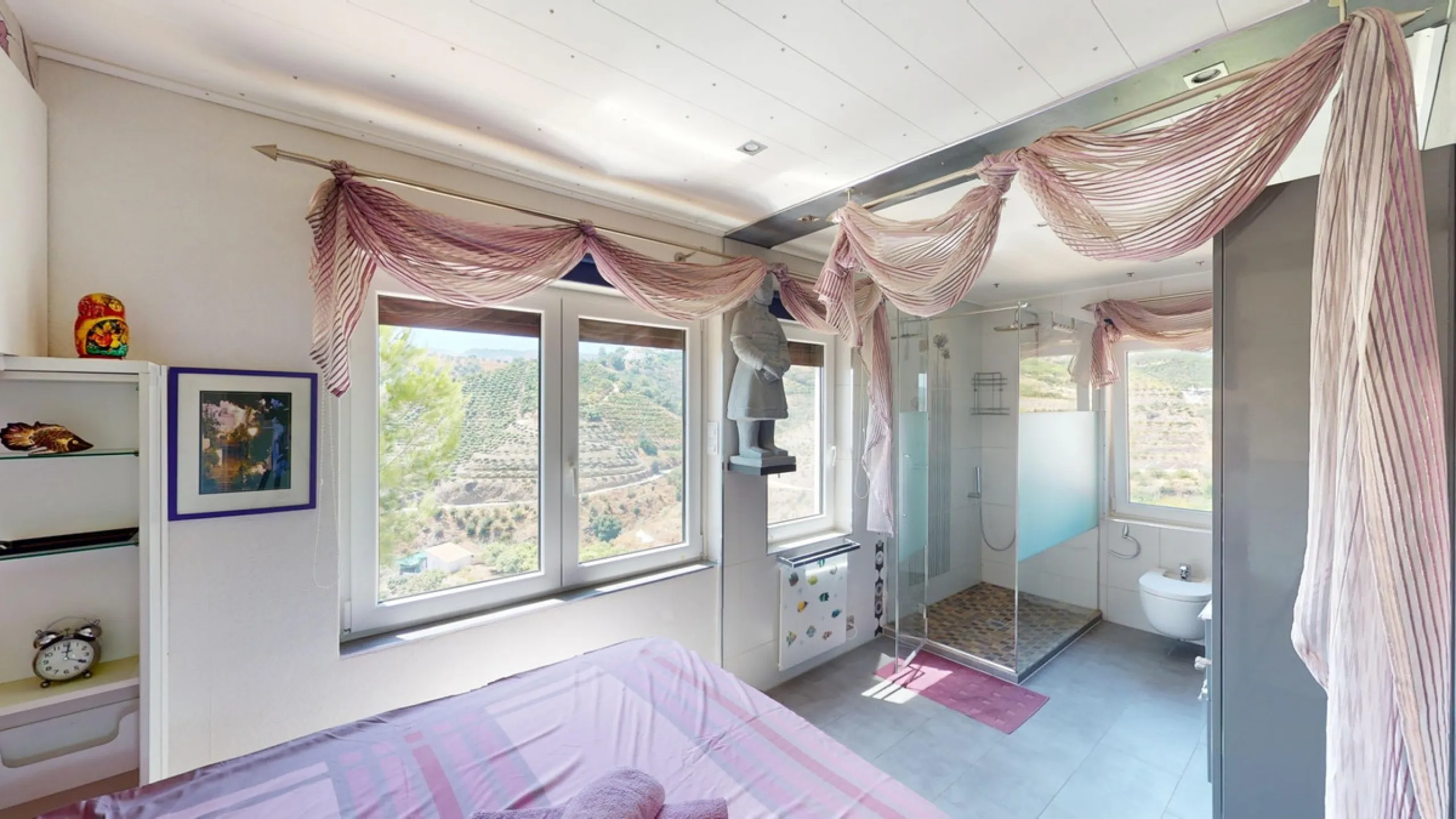 Stunning Villa Below Frigiliana for Sale. This impressive villa, nestled below Frigiliana, offers two separate living units across two floors, each with its own driveway and privacy. The upper unit spans 150 m2 and features a spacious open-plan living and