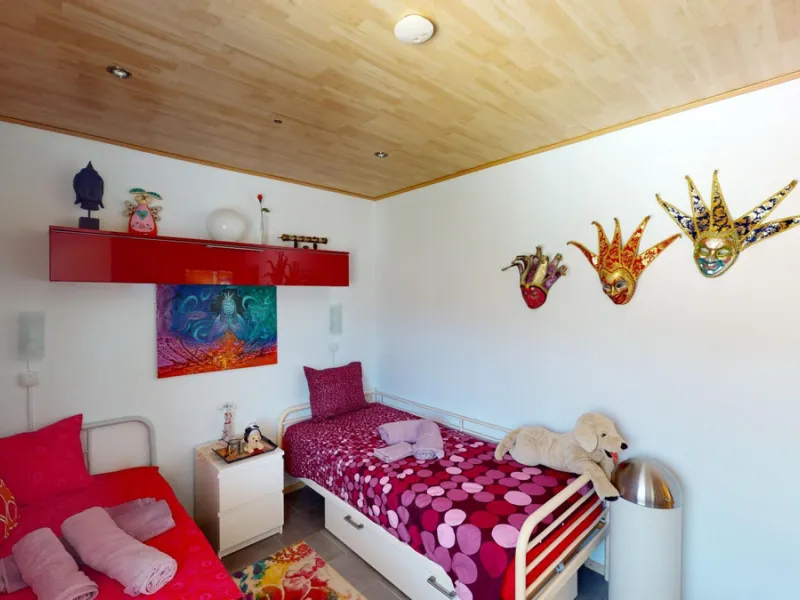 Stunning Villa Below Frigiliana for Sale. This impressive villa, nestled below Frigiliana, offers two separate living units across two floors, each with its own driveway and privacy. The upper unit spans 150 m2 and features a spacious open-plan living and