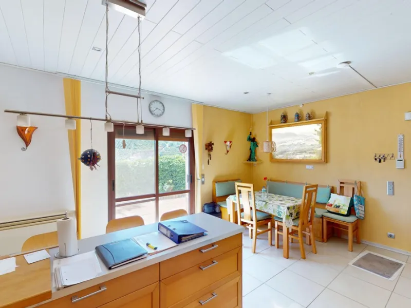 Stunning Villa Below Frigiliana for Sale. This impressive villa, nestled below Frigiliana, offers two separate living units across two floors, each with its own driveway and privacy. The upper unit spans 150 m2 and features a spacious open-plan living and