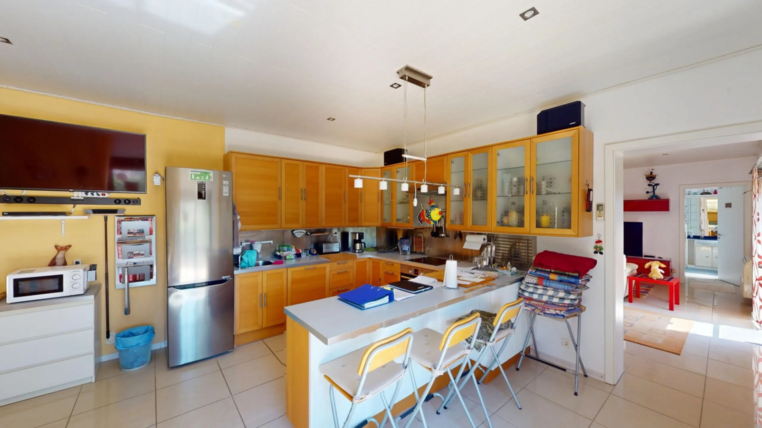 Stunning Villa Below Frigiliana for Sale. This impressive villa, nestled below Frigiliana, offers two separate living units across two floors, each with its own driveway and privacy. The upper unit spans 150 m2 and features a spacious open-plan living and