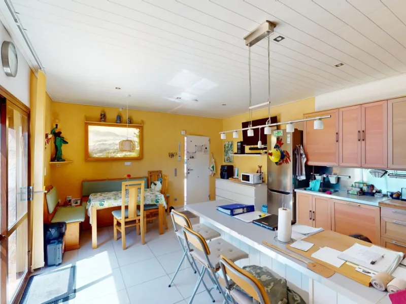 Stunning Villa Below Frigiliana for Sale. This impressive villa, nestled below Frigiliana, offers two separate living units across two floors, each with its own driveway and privacy. The upper unit spans 150 m2 and features a spacious open-plan living and