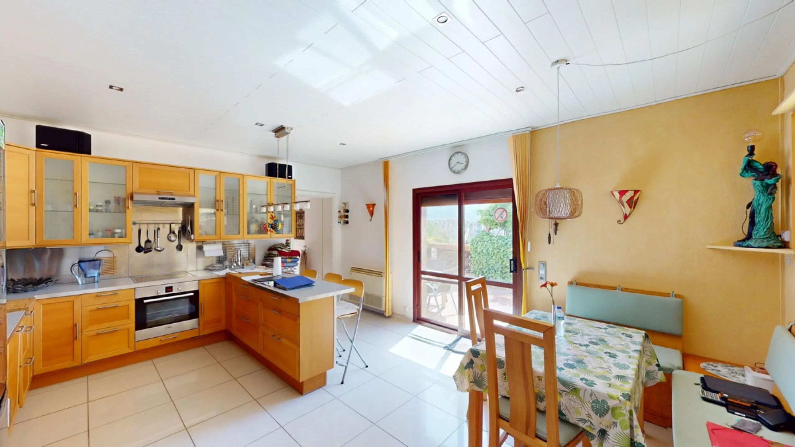 Stunning Villa Below Frigiliana for Sale. This impressive villa, nestled below Frigiliana, offers two separate living units across two floors, each with its own driveway and privacy. The upper unit spans 150 m2 and features a spacious open-plan living and