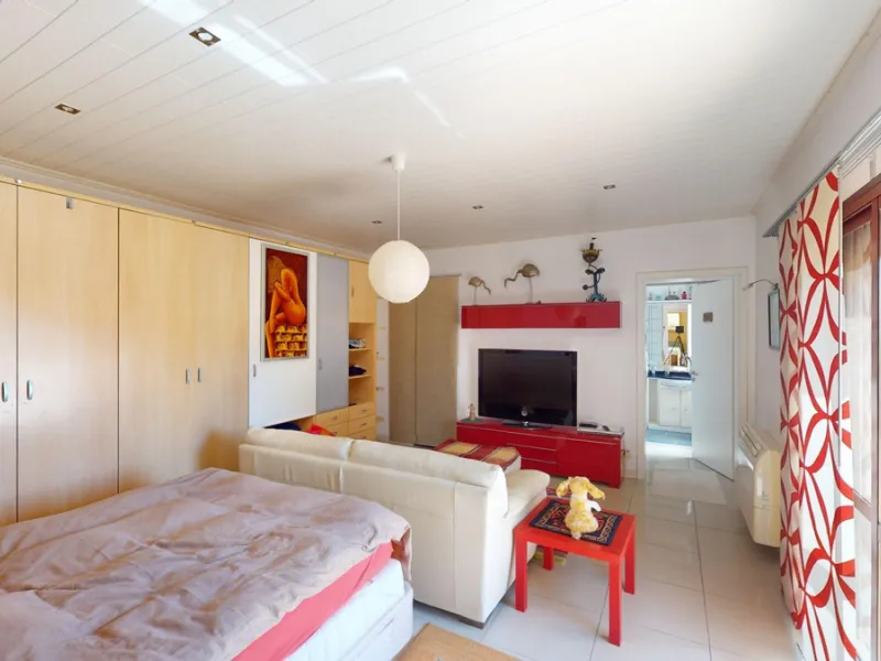 Stunning Villa Below Frigiliana for Sale. This impressive villa, nestled below Frigiliana, offers two separate living units across two floors, each with its own driveway and privacy. The upper unit spans 150 m2 and features a spacious open-plan living and