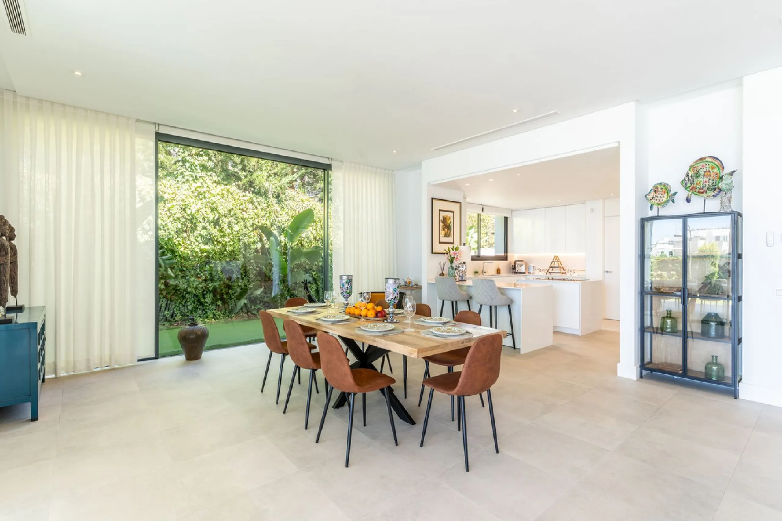 This exceptional luxury villa is situated in the prestigious area of Cabopino, Marbella East, offering a prime front line golf location with captivating views of both the sea and lush fairways. Designed to the highest standards, the property spans a gener