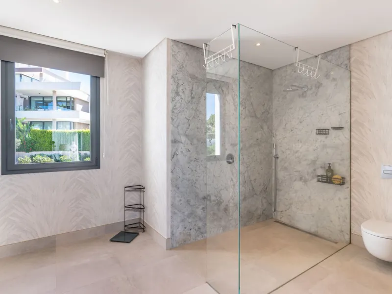 This exceptional luxury villa is situated in the prestigious area of Cabopino, Marbella East, offering a prime front line golf location with captivating views of both the sea and lush fairways. Designed to the highest standards, the property spans a gener
