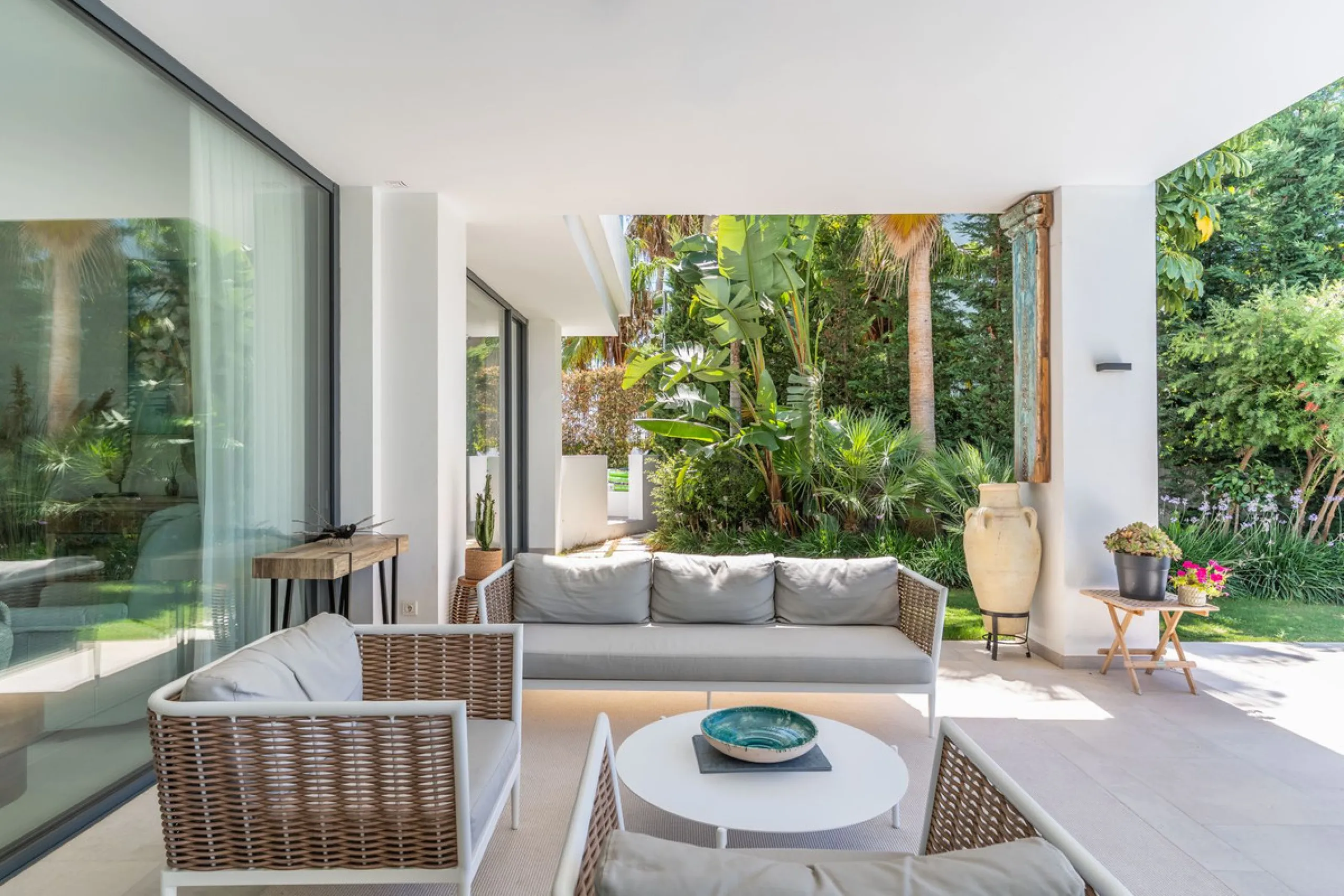 This exceptional luxury villa is situated in the prestigious area of Cabopino, Marbella East, offering a prime front line golf location with captivating views of both the sea and lush fairways. Designed to the highest standards, the property spans a gener
