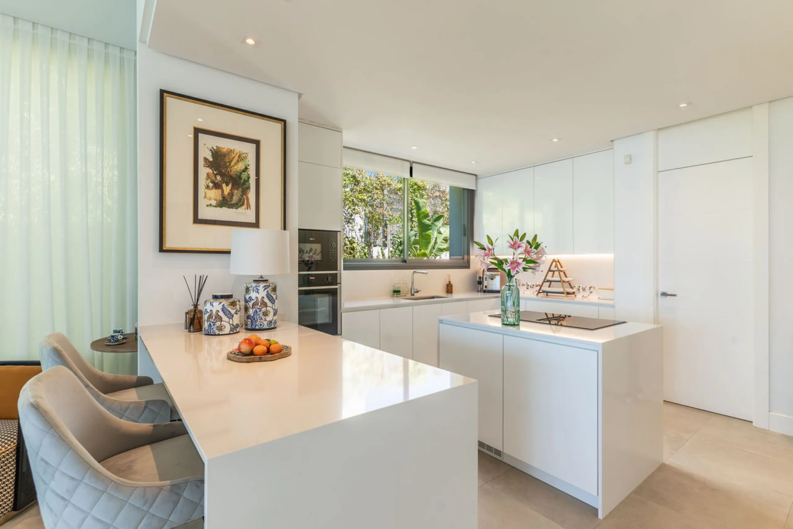 This exceptional luxury villa is situated in the prestigious area of Cabopino, Marbella East, offering a prime front line golf location with captivating views of both the sea and lush fairways. Designed to the highest standards, the property spans a gener