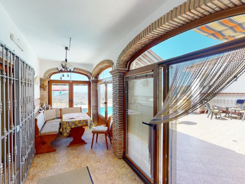 This exceptional, spacious U-shaped villa is located in the picturesque area of Iznate and offers two separate living units, each fully equipped. The villa spans two floors and features a total of seven bedrooms and six bathrooms. Each unit includes a fun
