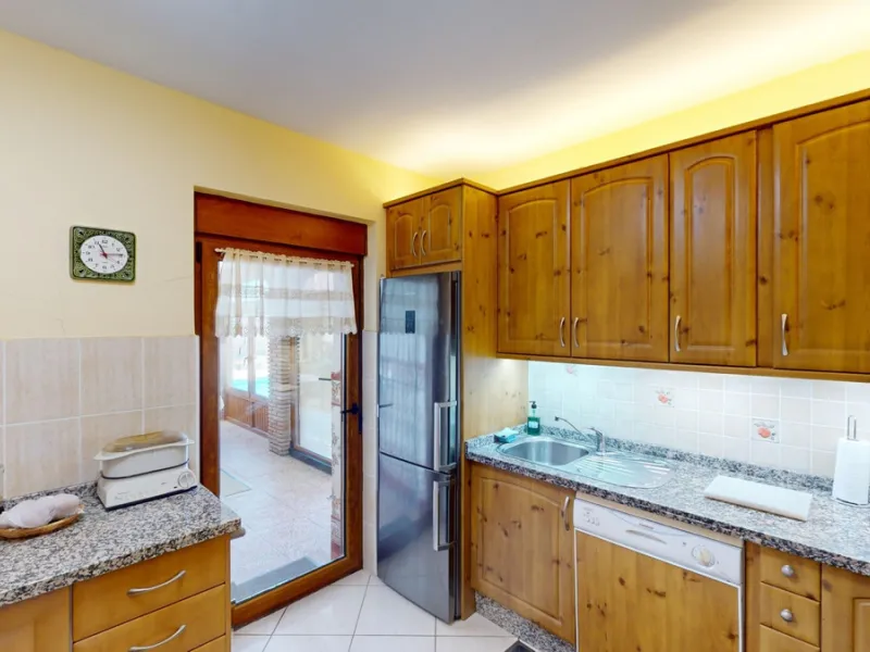This exceptional, spacious U-shaped villa is located in the picturesque area of Iznate and offers two separate living units, each fully equipped. The villa spans two floors and features a total of seven bedrooms and six bathrooms. Each unit includes a fun