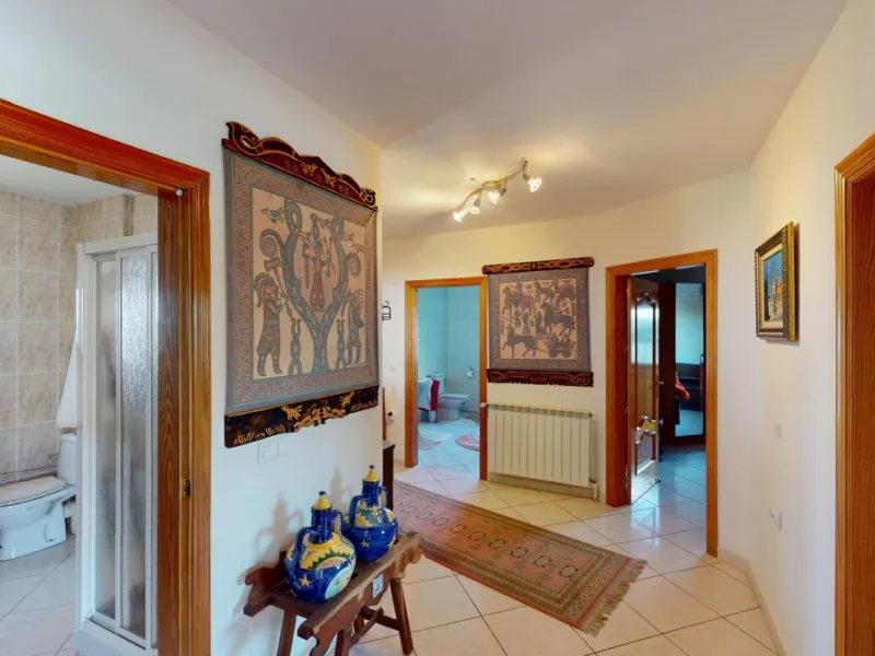 This exceptional, spacious U-shaped villa is located in the picturesque area of Iznate and offers two separate living units, each fully equipped. The villa spans two floors and features a total of seven bedrooms and six bathrooms. Each unit includes a fun