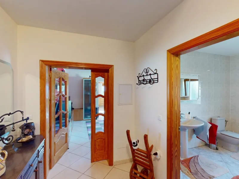 This exceptional, spacious U-shaped villa is located in the picturesque area of Iznate and offers two separate living units, each fully equipped. The villa spans two floors and features a total of seven bedrooms and six bathrooms. Each unit includes a fun