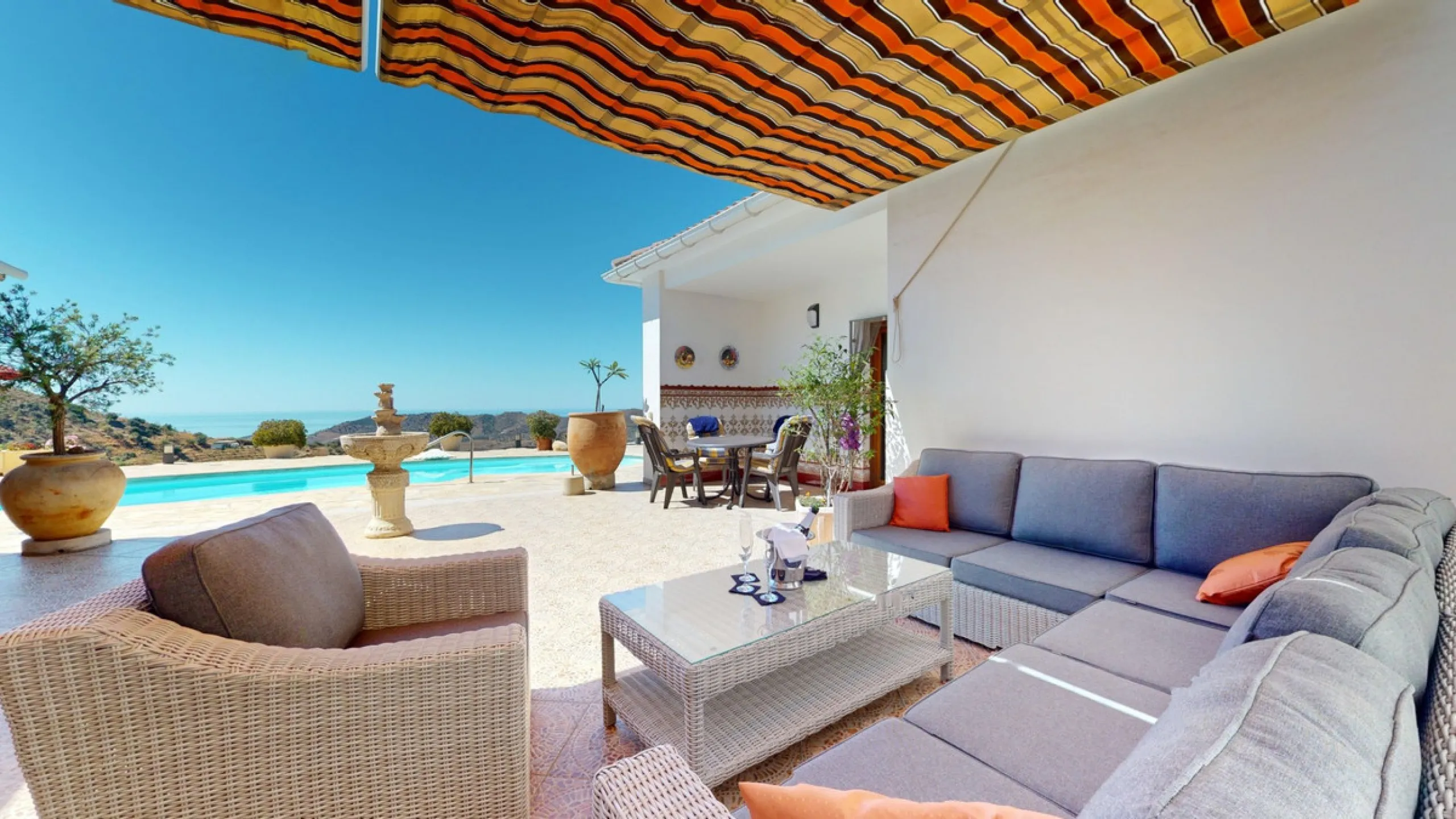 This exceptional, spacious U-shaped villa is located in the picturesque area of Iznate and offers two separate living units, each fully equipped. The villa spans two floors and features a total of seven bedrooms and six bathrooms. Each unit includes a fun