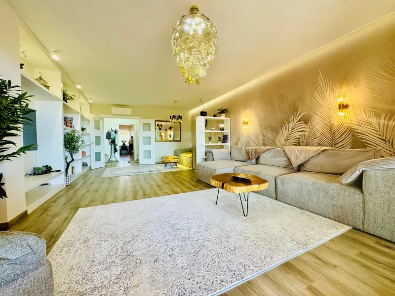 The property boasts an elegant layout and well-defined spaces. It features a closed area of one hundred forty-four meters and forty square decimeters, complemented by a covered terrace of sixty meters and nine square decimeters, and an uncovered terrace o
