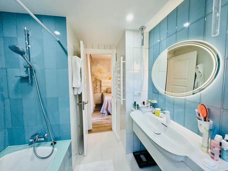The property boasts an elegant layout and well-defined spaces. It features a closed area of one hundred forty-four meters and forty square decimeters, complemented by a covered terrace of sixty meters and nine square decimeters, and an uncovered terrace o