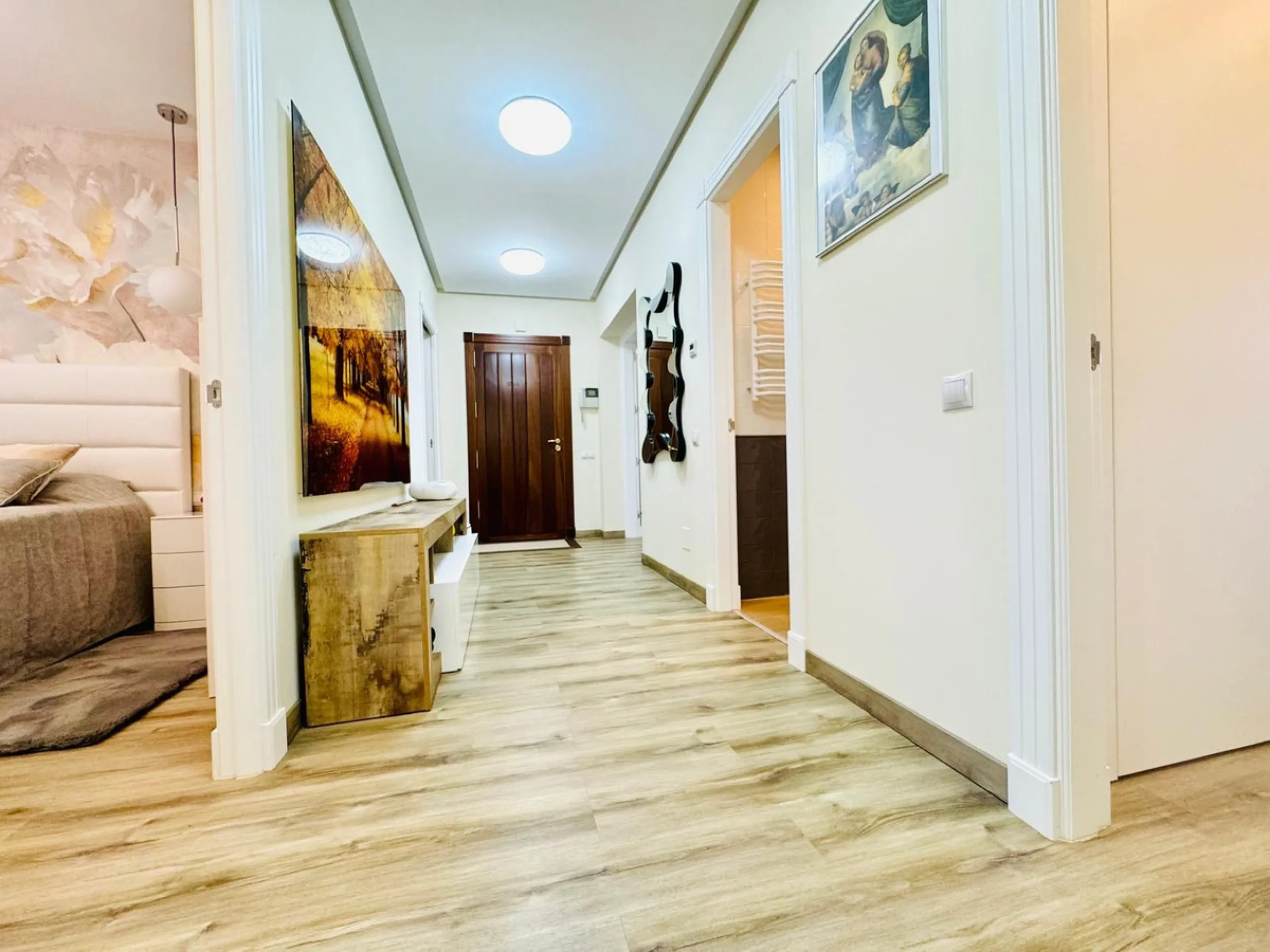 The property boasts an elegant layout and well-defined spaces. It features a closed area of one hundred forty-four meters and forty square decimeters, complemented by a covered terrace of sixty meters and nine square decimeters, and an uncovered terrace o