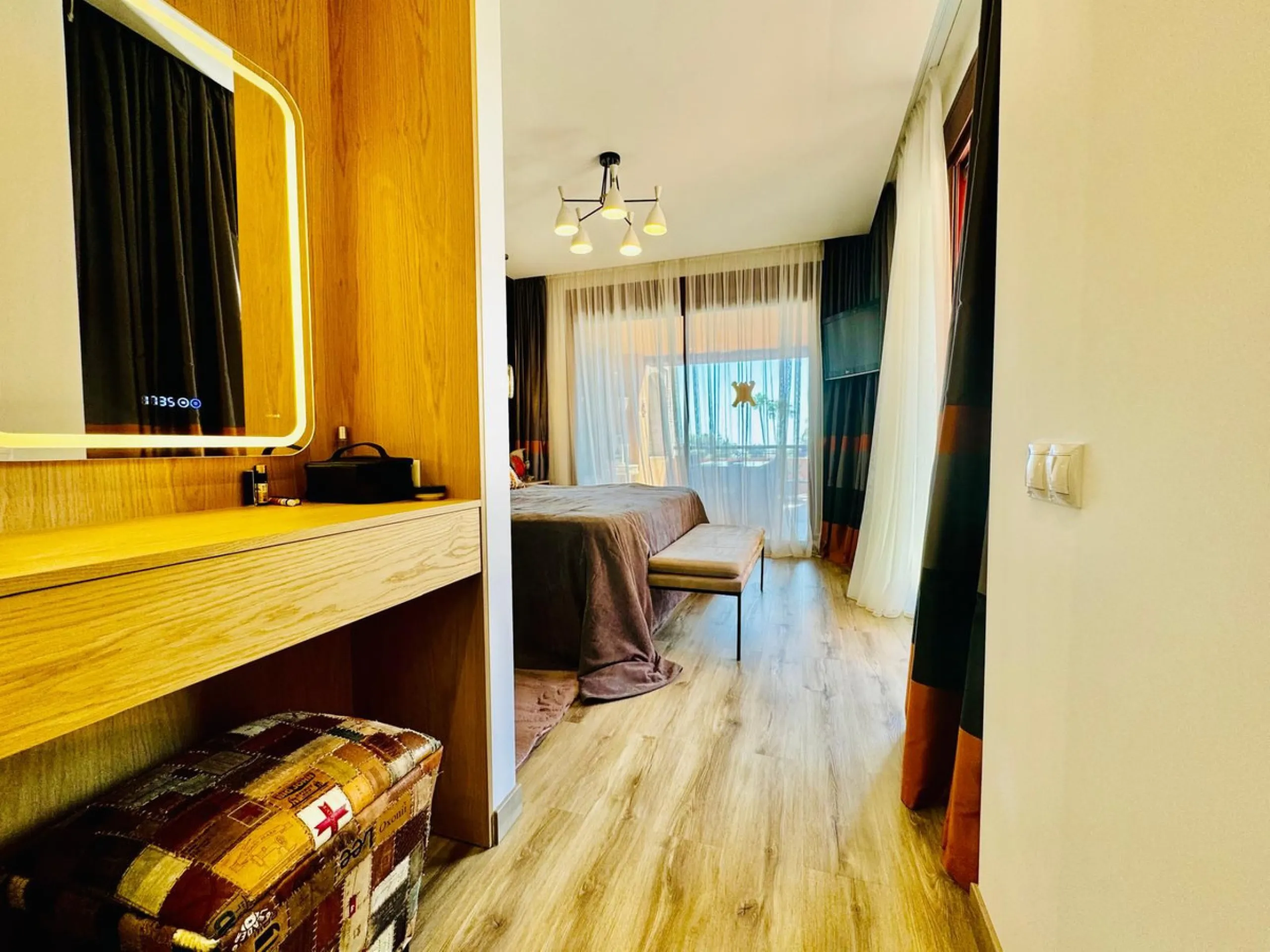 The property boasts an elegant layout and well-defined spaces. It features a closed area of one hundred forty-four meters and forty square decimeters, complemented by a covered terrace of sixty meters and nine square decimeters, and an uncovered terrace o