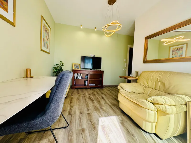 The property boasts an elegant layout and well-defined spaces. It features a closed area of one hundred forty-four meters and forty square decimeters, complemented by a covered terrace of sixty meters and nine square decimeters, and an uncovered terrace o