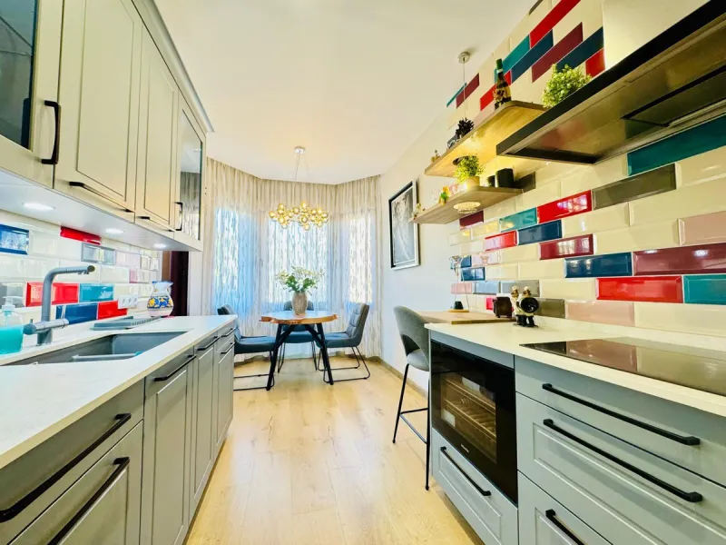 The property boasts an elegant layout and well-defined spaces. It features a closed area of one hundred forty-four meters and forty square decimeters, complemented by a covered terrace of sixty meters and nine square decimeters, and an uncovered terrace o