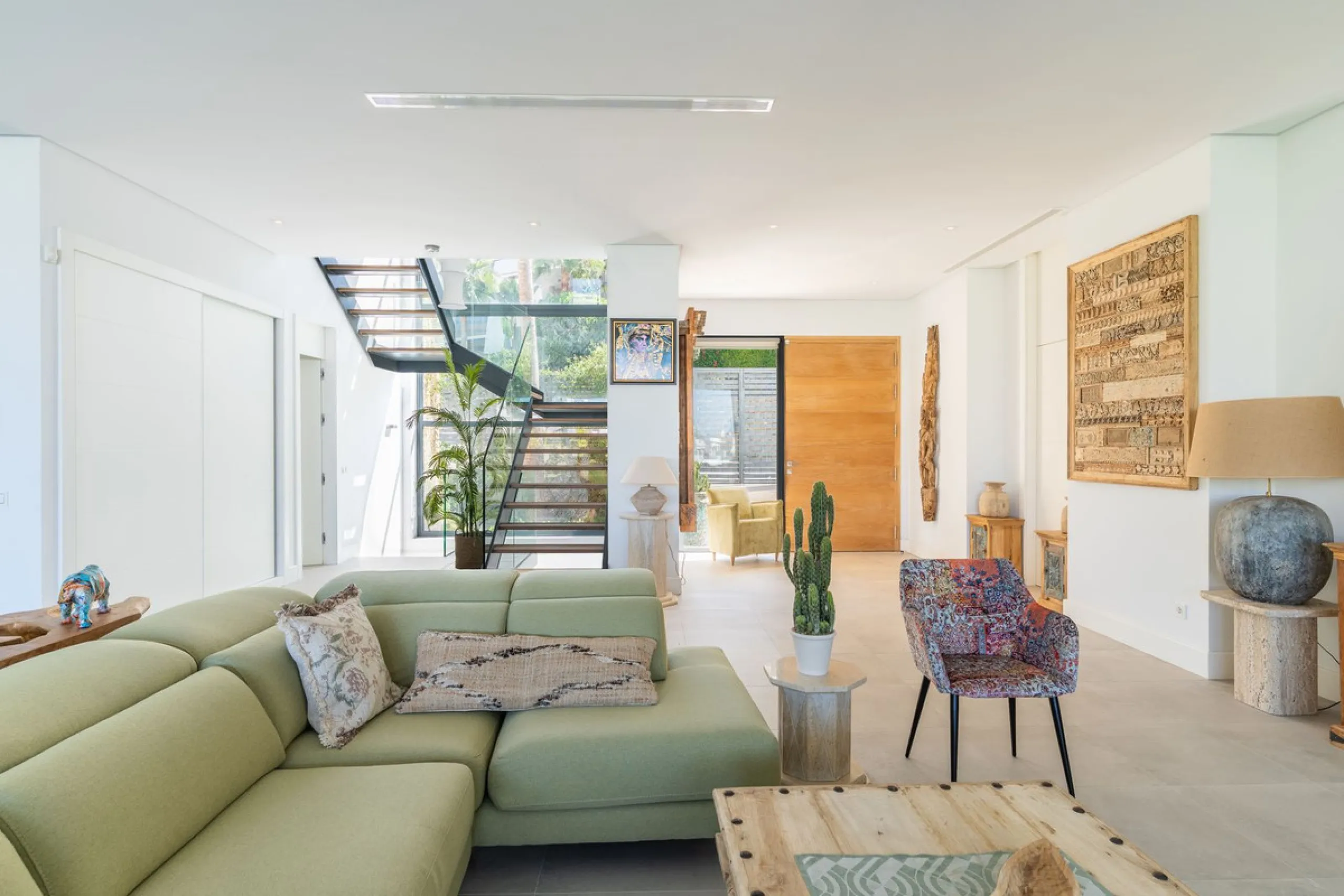 This exceptional luxury villa is situated in the prestigious area of Cabopino, Marbella East, offering a prime front line golf location with captivating views of both the sea and lush fairways. Designed to the highest standards, the property spans a gener