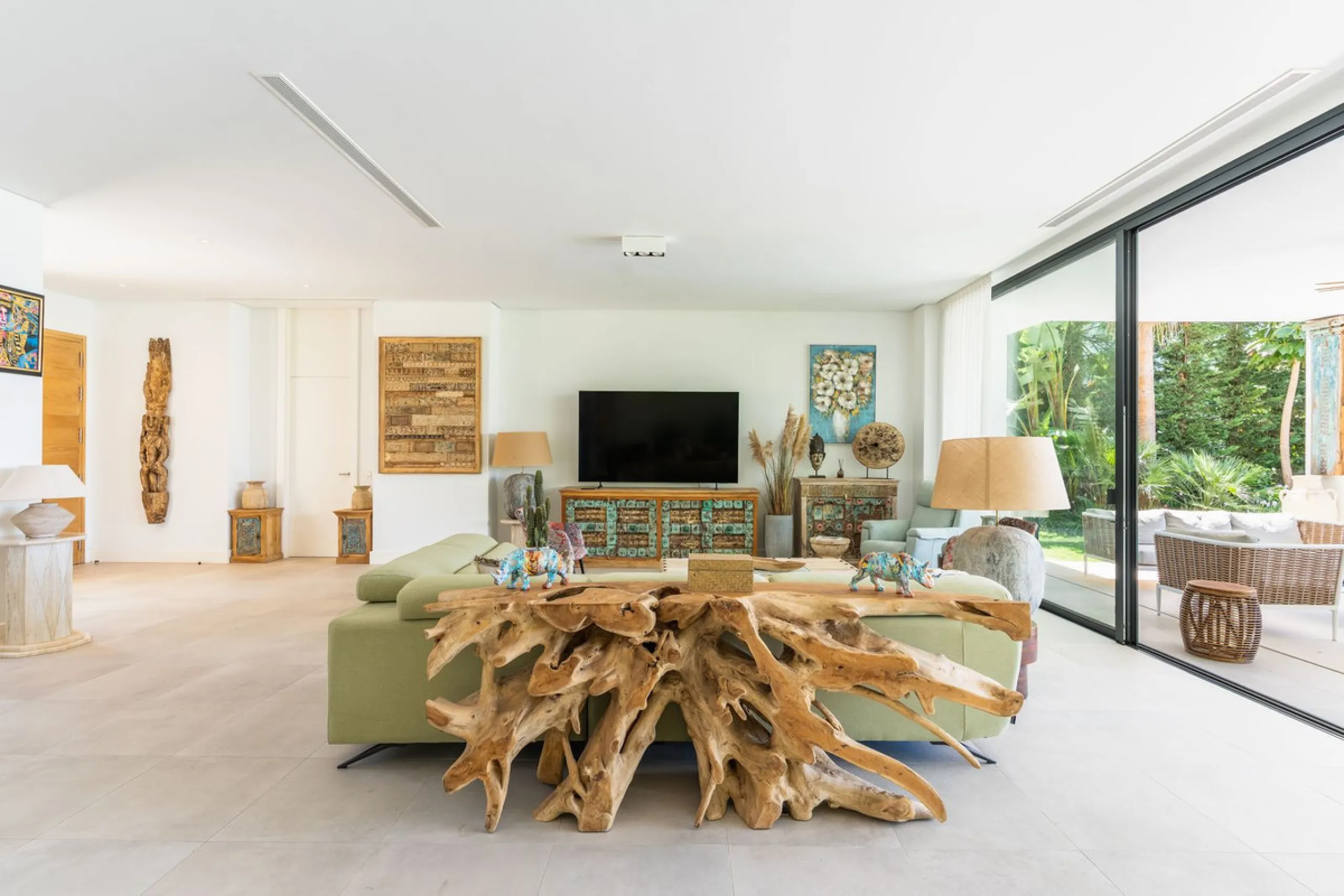 This exceptional luxury villa is situated in the prestigious area of Cabopino, Marbella East, offering a prime front line golf location with captivating views of both the sea and lush fairways. Designed to the highest standards, the property spans a gener