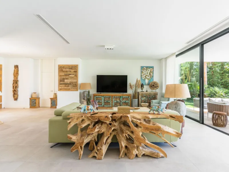 This exceptional luxury villa is situated in the prestigious area of Cabopino, Marbella East, offering a prime front line golf location with captivating views of both the sea and lush fairways. Designed to the highest standards, the property spans a gener