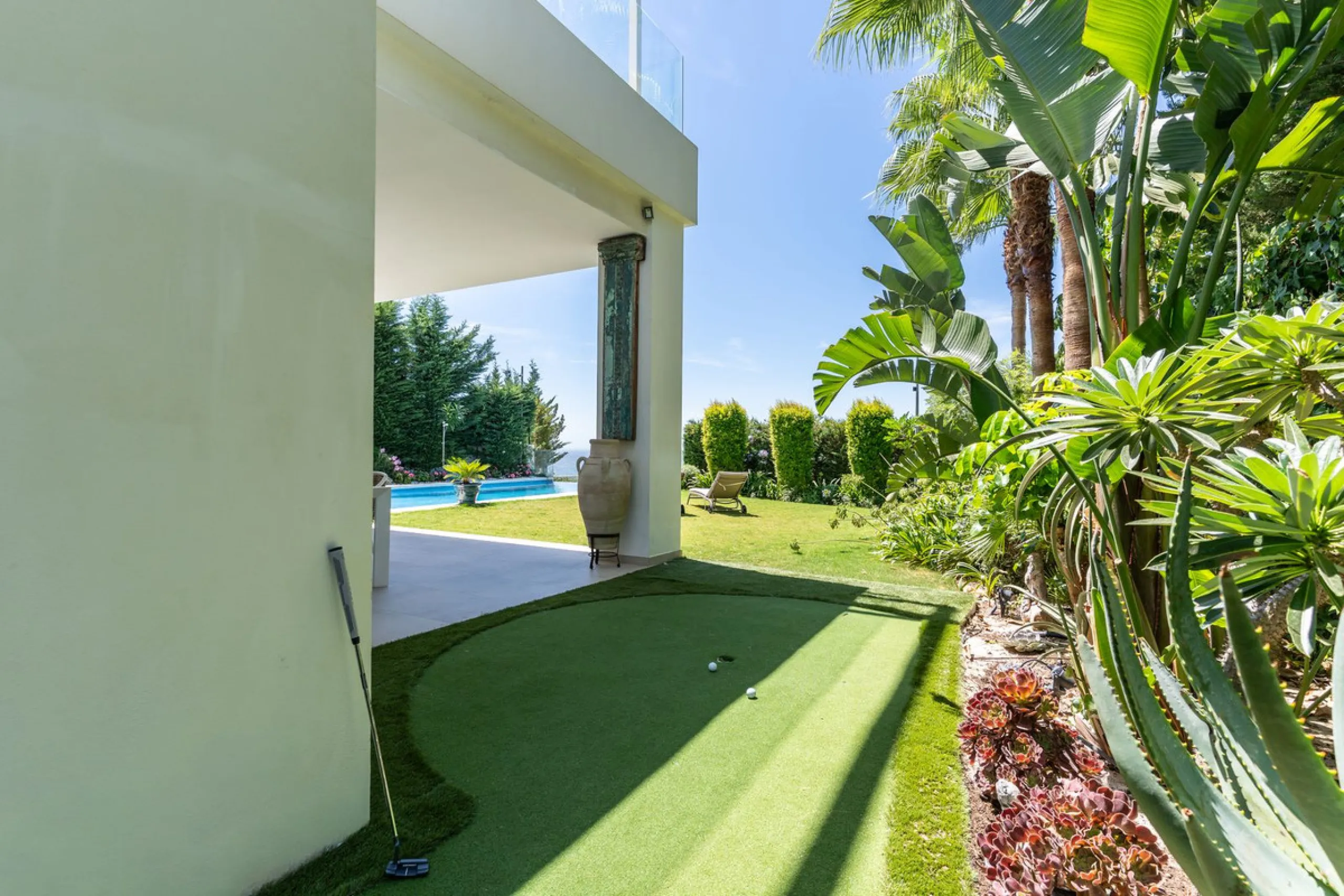 This exceptional luxury villa is situated in the prestigious area of Cabopino, Marbella East, offering a prime front line golf location with captivating views of both the sea and lush fairways. Designed to the highest standards, the property spans a gener