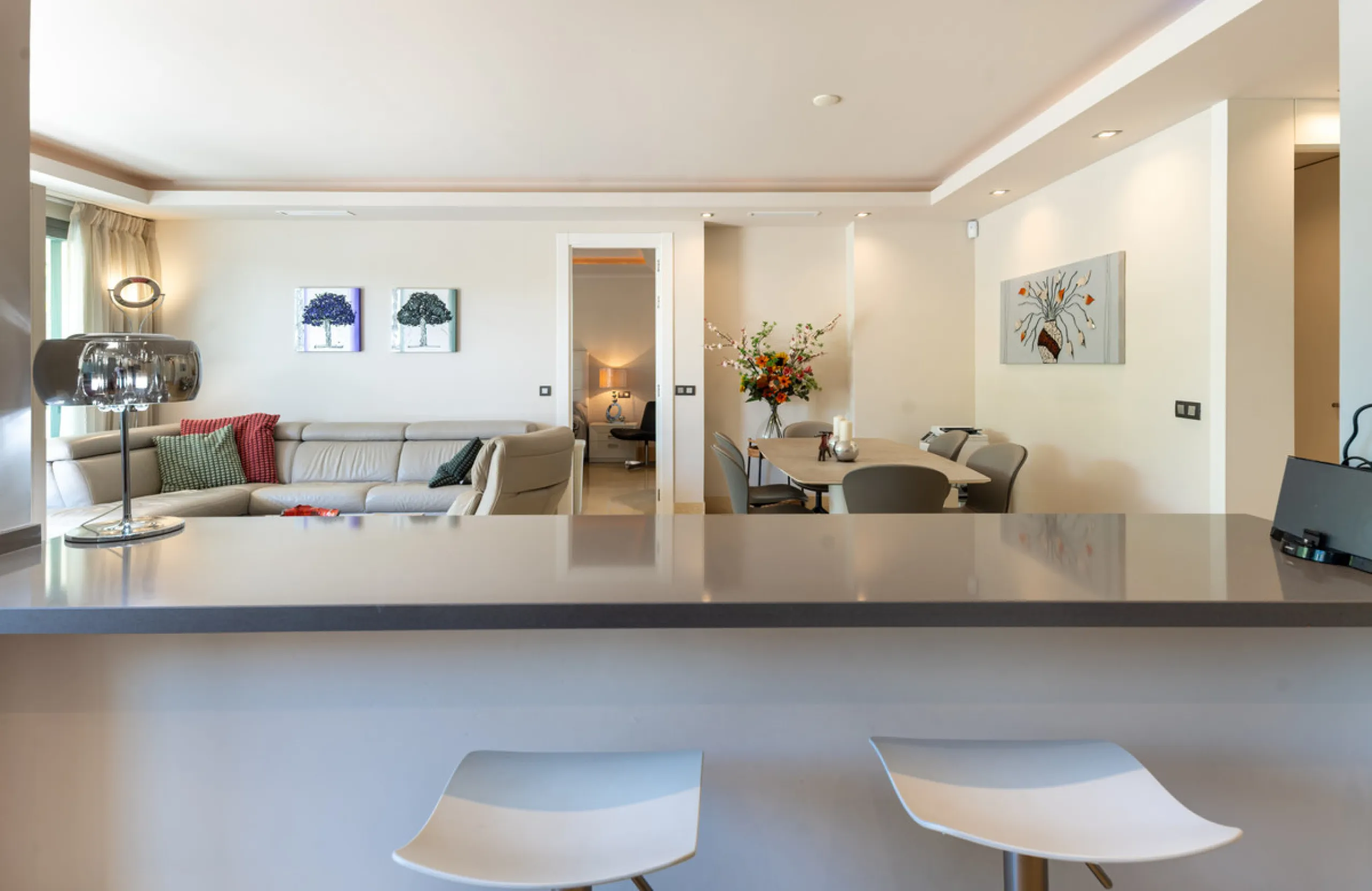This modern apartment offers a range of features designed to enhance your living experience. The property boasts three bedrooms, each with its own en-suite bathroom, adding a touch of luxury. The apartment's west orientation allows for ample natural light